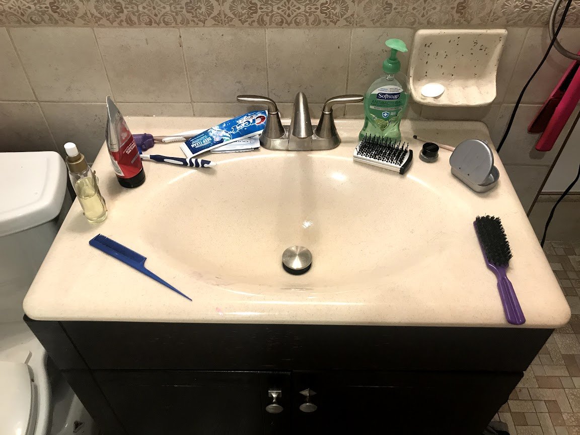 Rashard Peppers, "A Working Family," 2018. "A messy bathroom sink as everyone tries to get ready on a Monday morning."