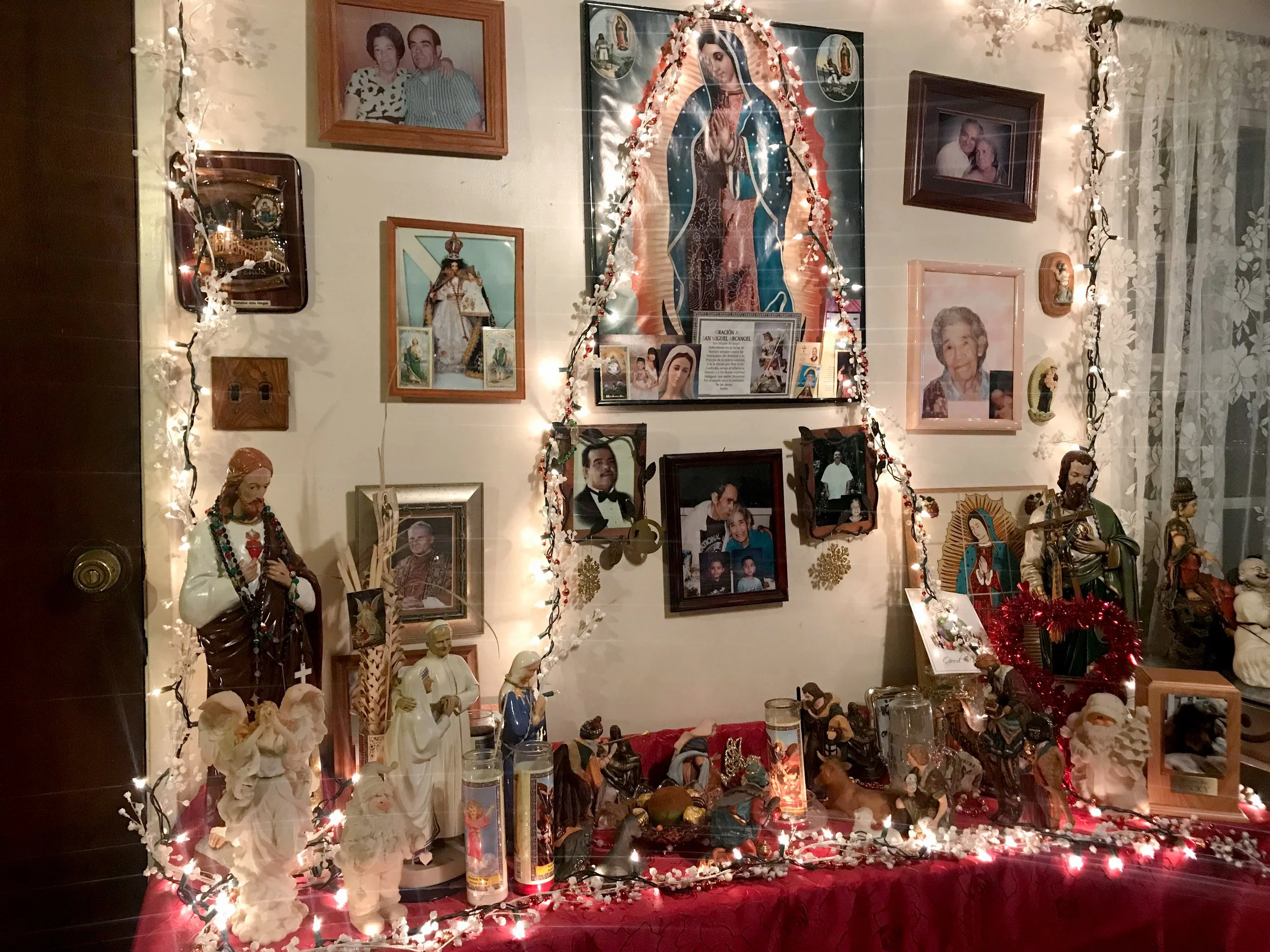 Serena Castillo, "Treasures," 2017. 
My grandmother has an altar in her home. It expresses her religious beliefs and contains many memories of those who have passed. Her photos include multiple generations of our family members and we are reminded of