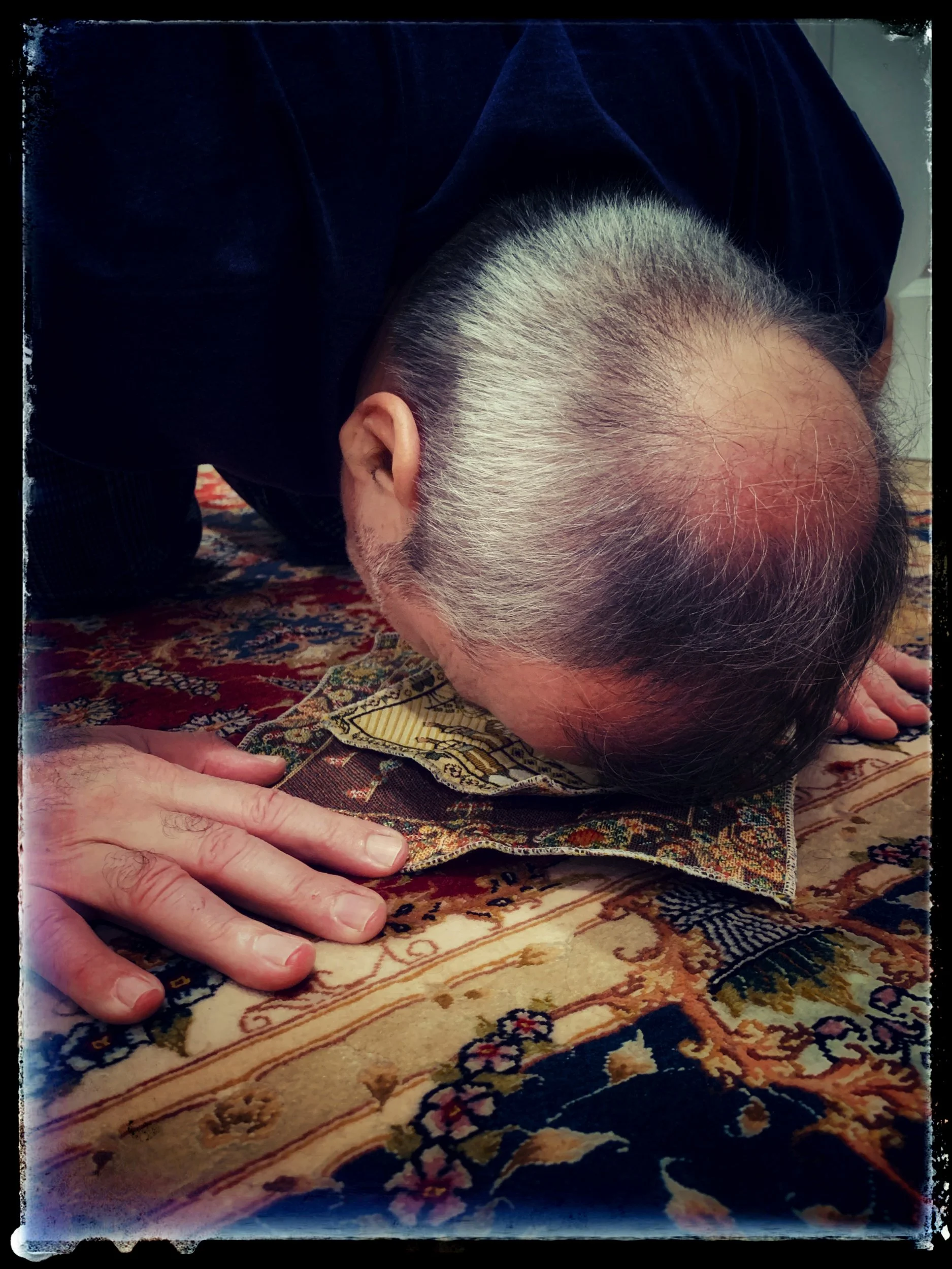 Niloofar Sahimi, "Retrospective Prayers," 2021. As a Muslim family, praying at least five times a day is vital to exemplifying unity and staying mindful of the obligations of the practice. Here, my dad is putting forth his commitment to the practice
