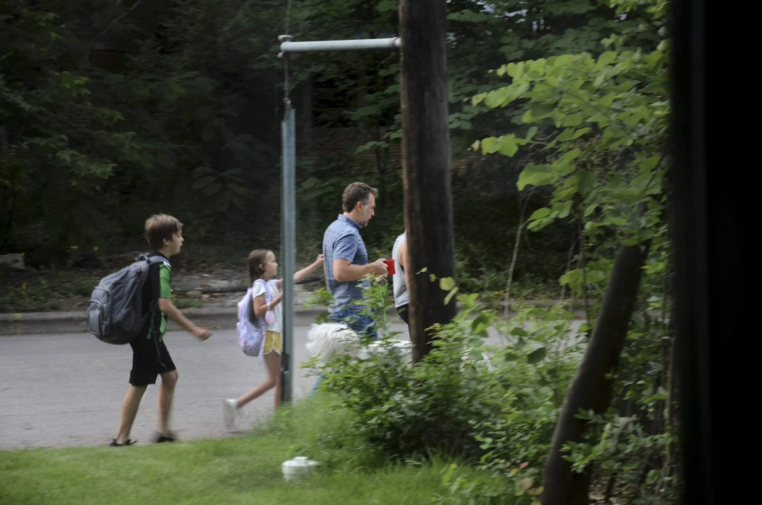 Max Davis, "Walk," 2022.
My parents walk my brother and sister to school every morning.