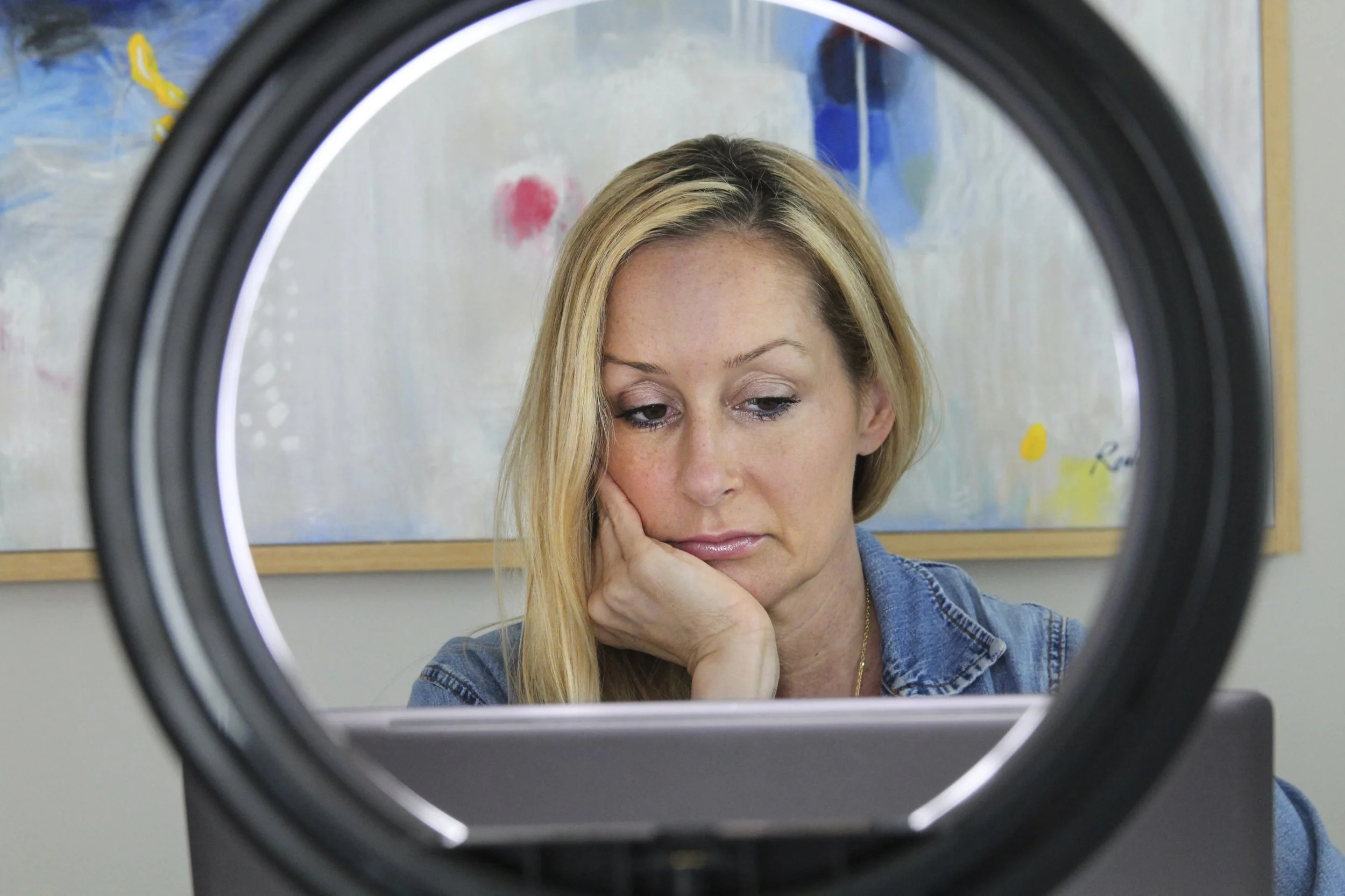 Chloe Lewcock, "Focused...," 2022.
A lot of my mom’s work consists of her working from home... and that means meetings. While some are on the phone, and some are on Zoom, they still exhibit optimum focus. As I watch her on this one, I can see how she