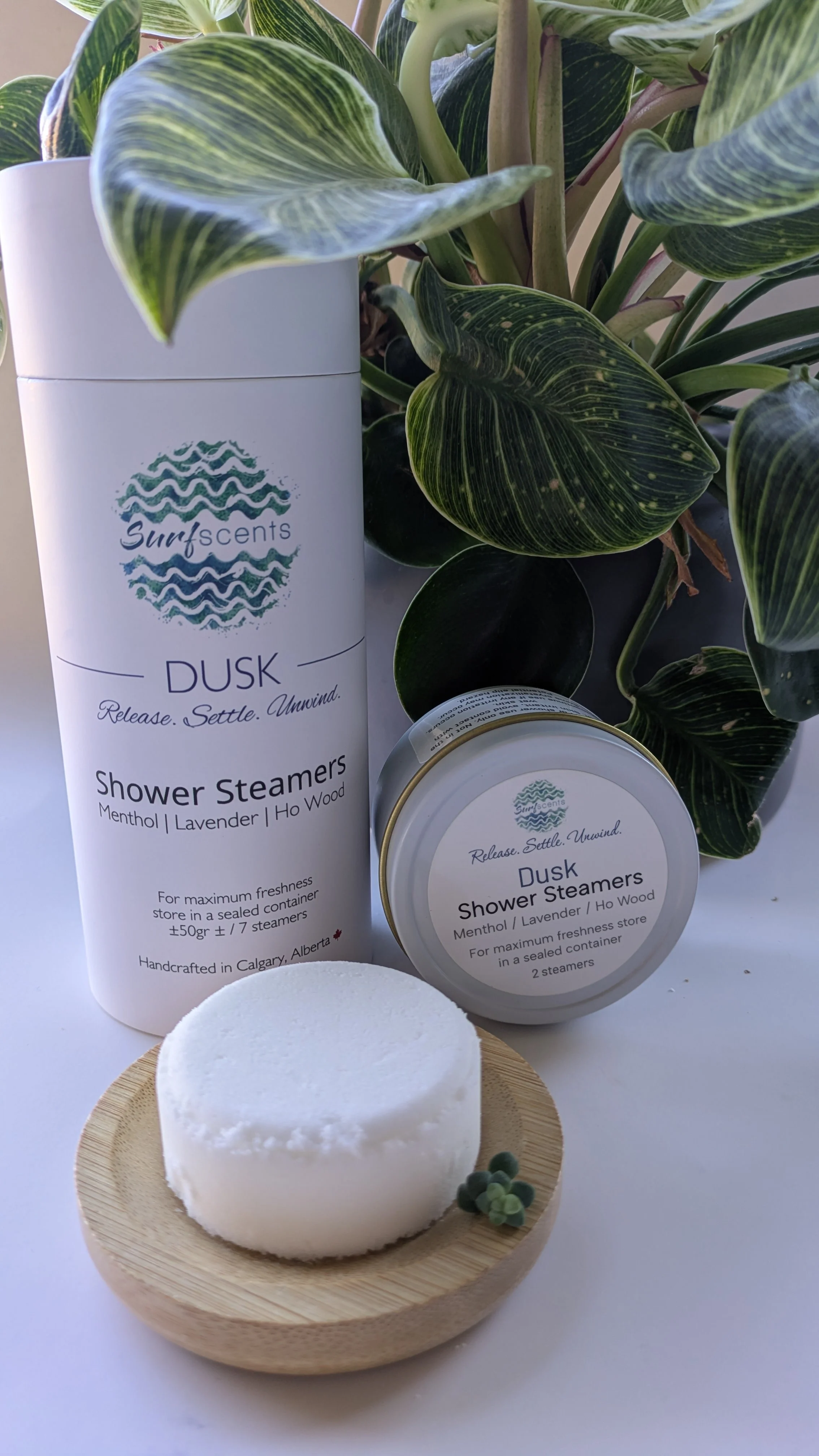 Dusk Shower Steamer tin, cylinder, and single tablet.