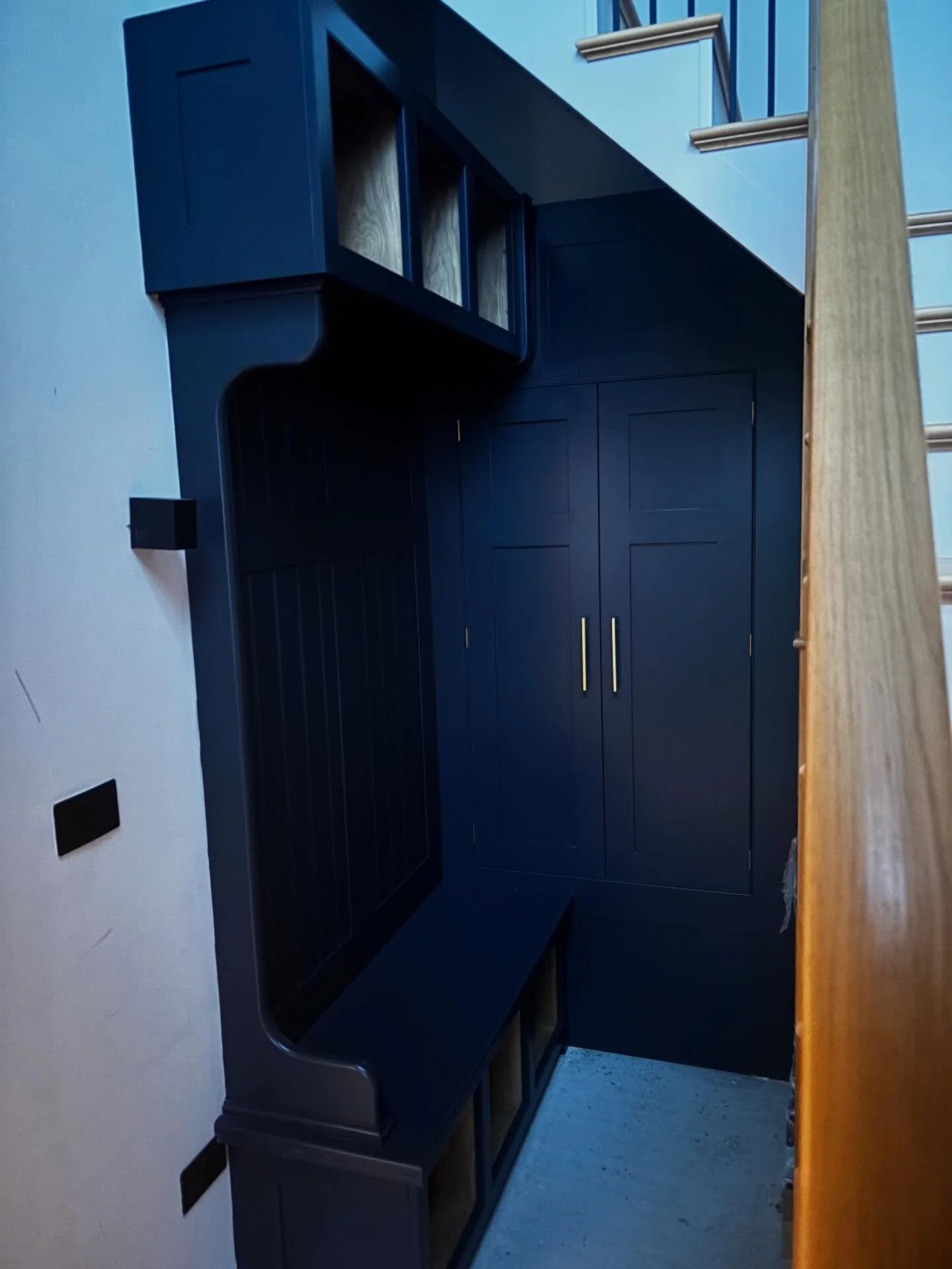Last install of the year!😇

Understated luxury, designed with purpose.
This bespoke boot room transforms an often-overlooked space into a statement of craftsmanship. Deep navy cabinetry, refined brass detailing, and beautifully finished interiors cr