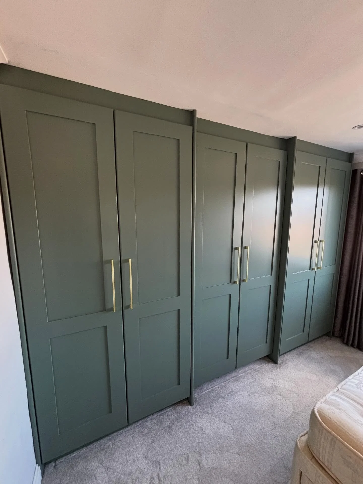 Looking to upgrade your bedroom storage?

These bespoke fitted wardrobes are made to measure and finished in Farrow &amp; Ball Green Smoke &mdash; a stylish, on-trend colour that adds depth and character while still feeling calm and timeless. Paired 