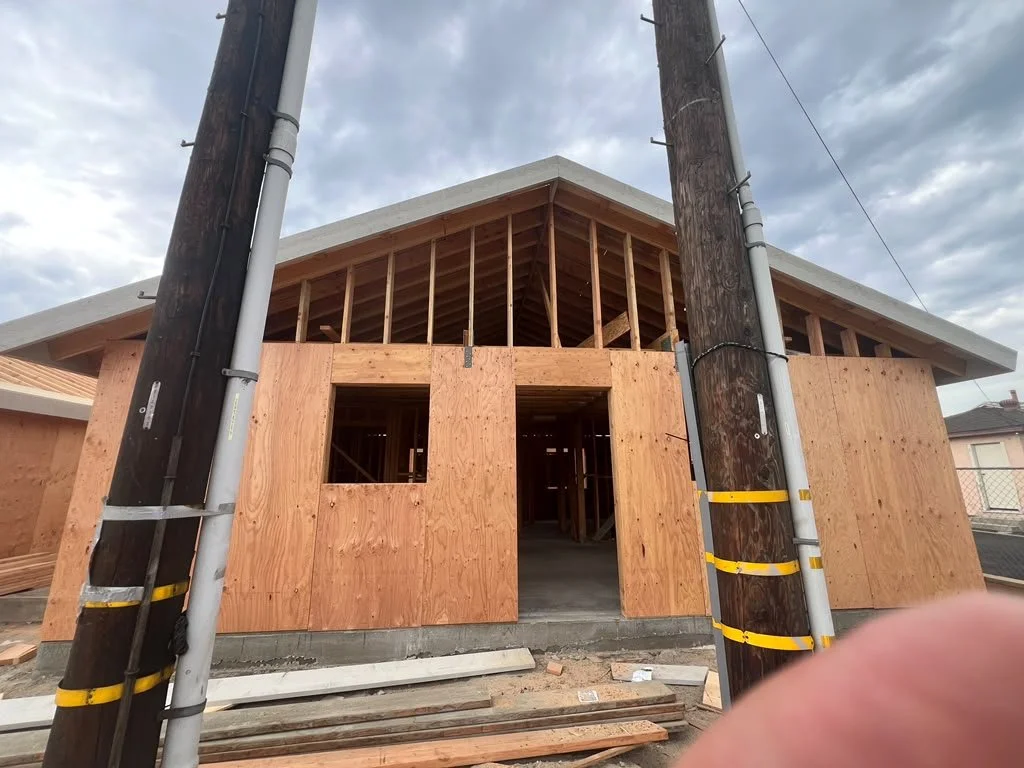 Plywood wall sheathing and exposed gable framing
