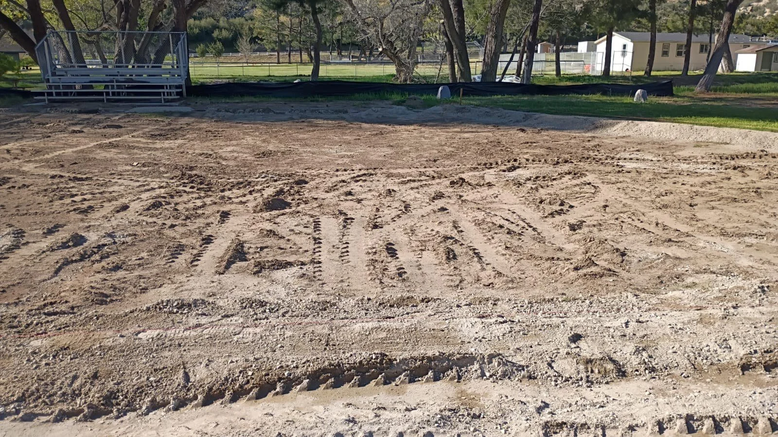 Prepared ground before installation of the obstacle course.