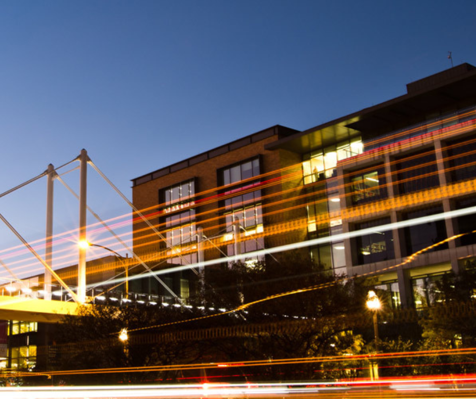 Moody College of Communication building at night