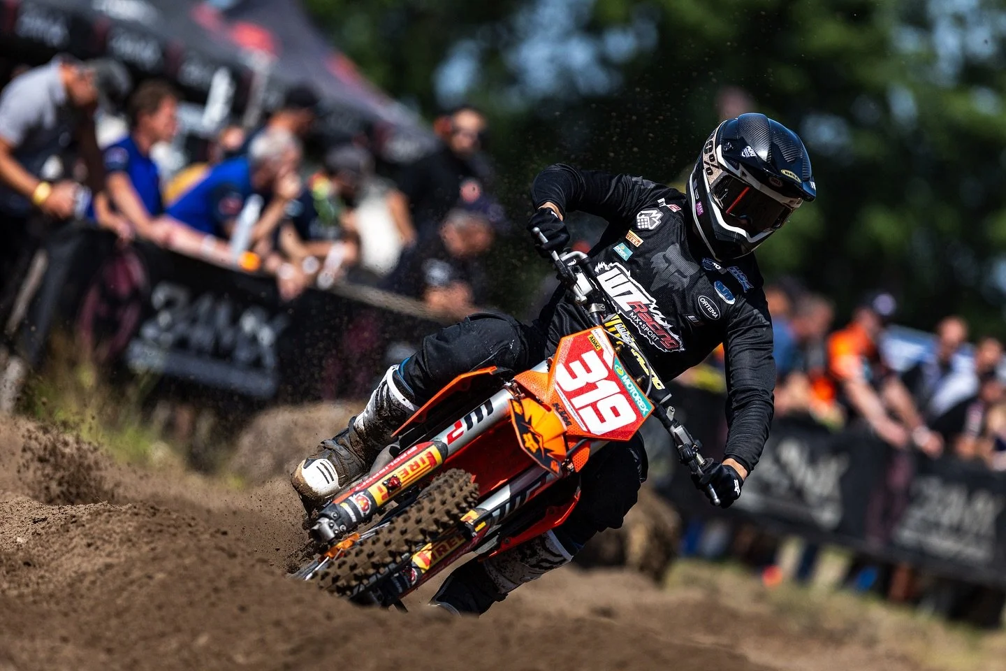 motocross rider cornering during race