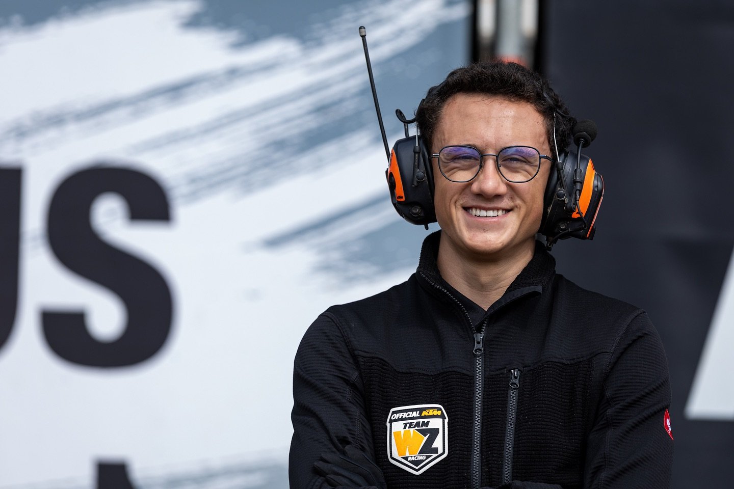 motocross team member portrait with headset