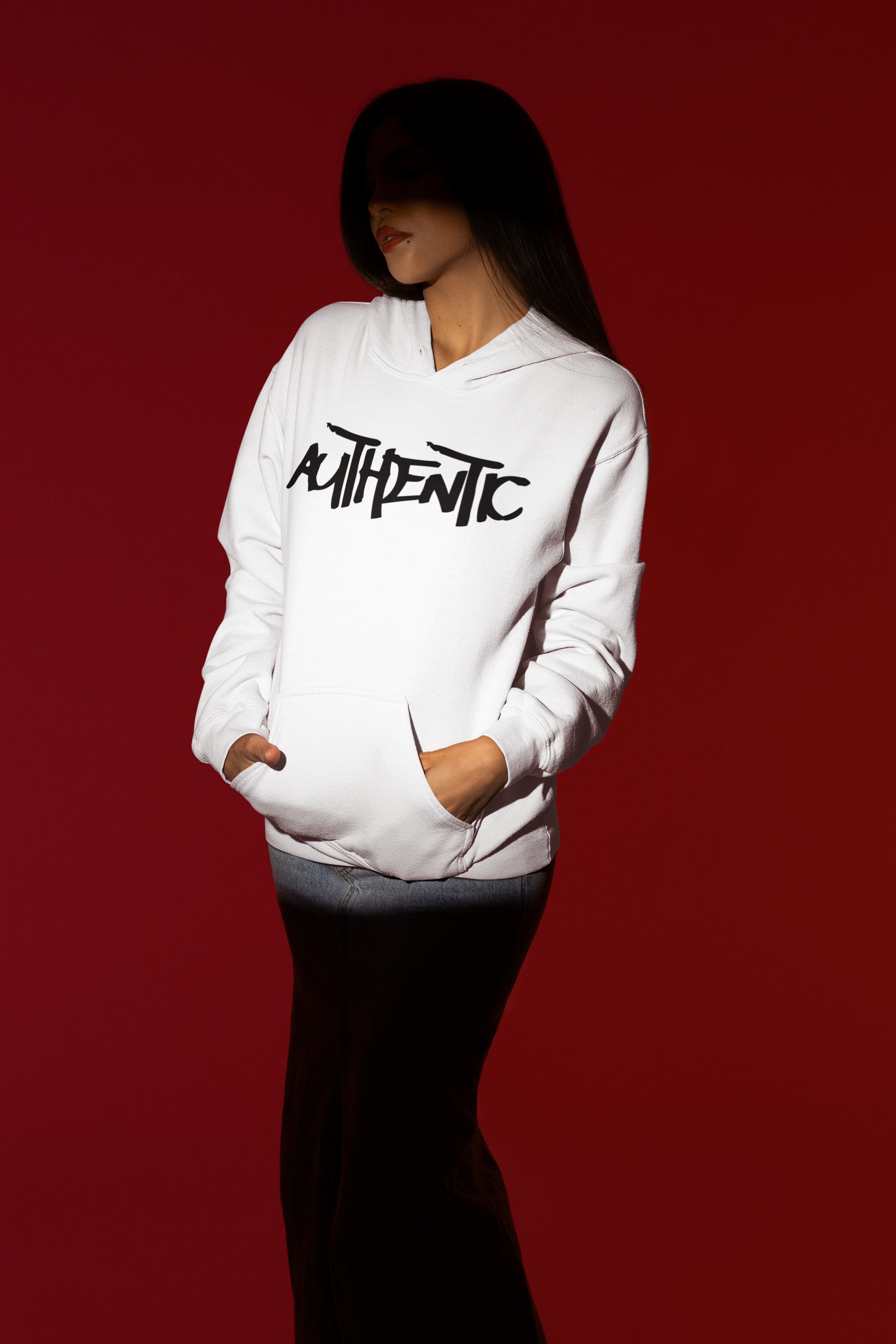 spotlight-styled-mockup-of-a-woman-posing-with-a-gildan-hoodie-m50002.png