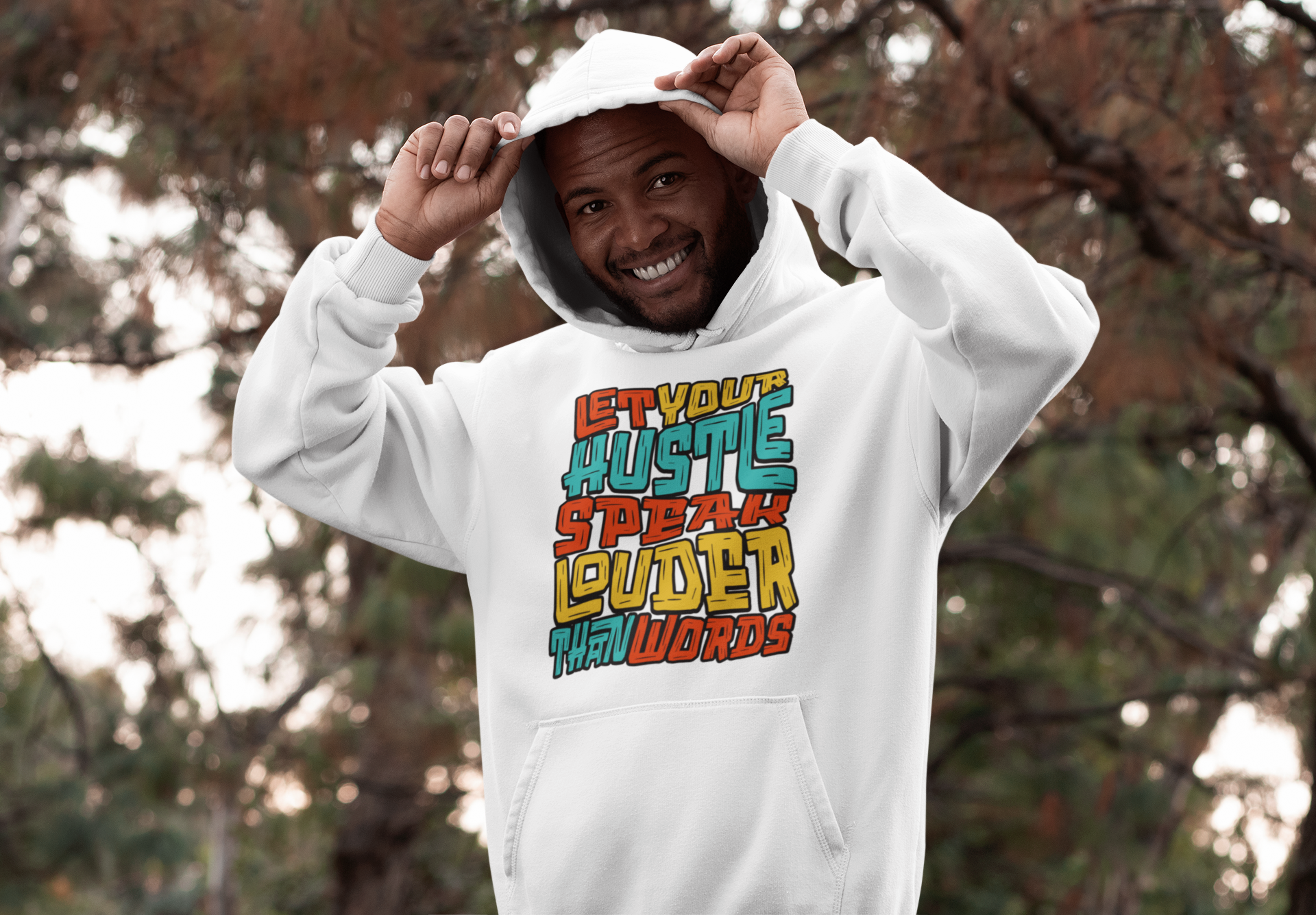 hoodie-pullover-mockup-featuring-a-joyful-man-in-the-woods-30306.png