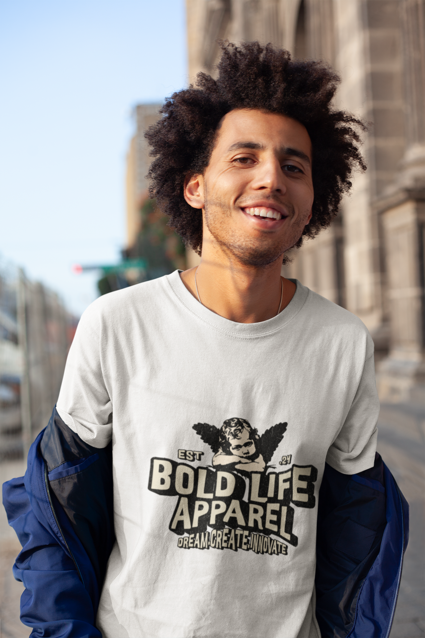 tee-mockup-of-a-happy-man-with-an-afro-out-on-the-street-18071.png