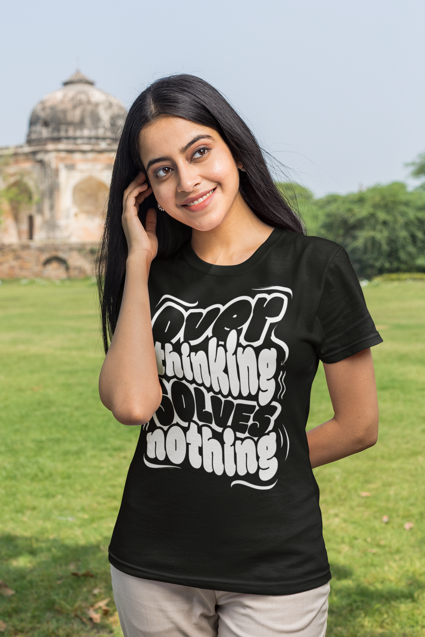 t-shirt-mockup-of-a-young-woman-posing-in-front-of-an-indian-temple-m25839.png