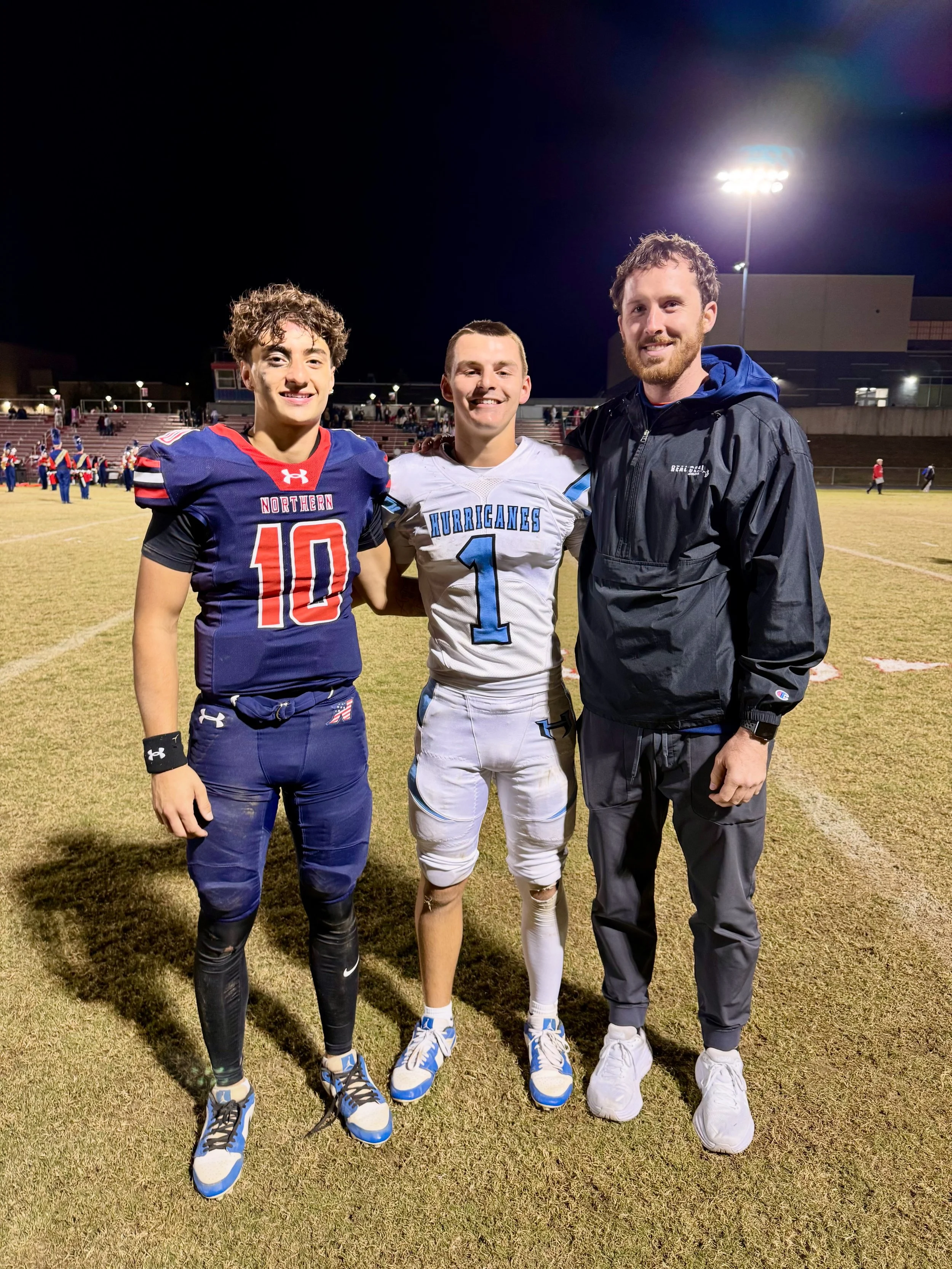 High school football players in a game in leonardtown md