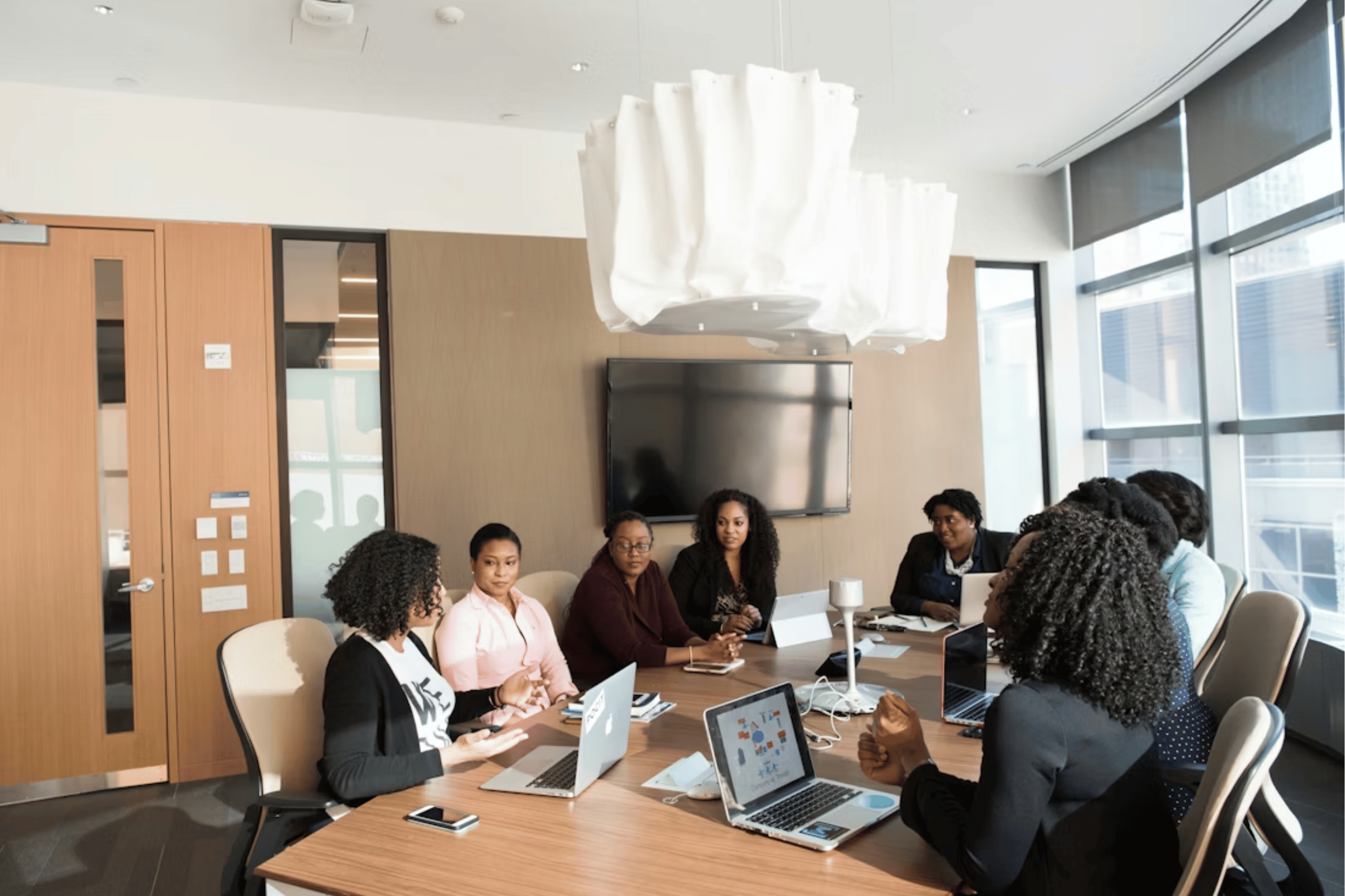 Group of people having a meeting.png