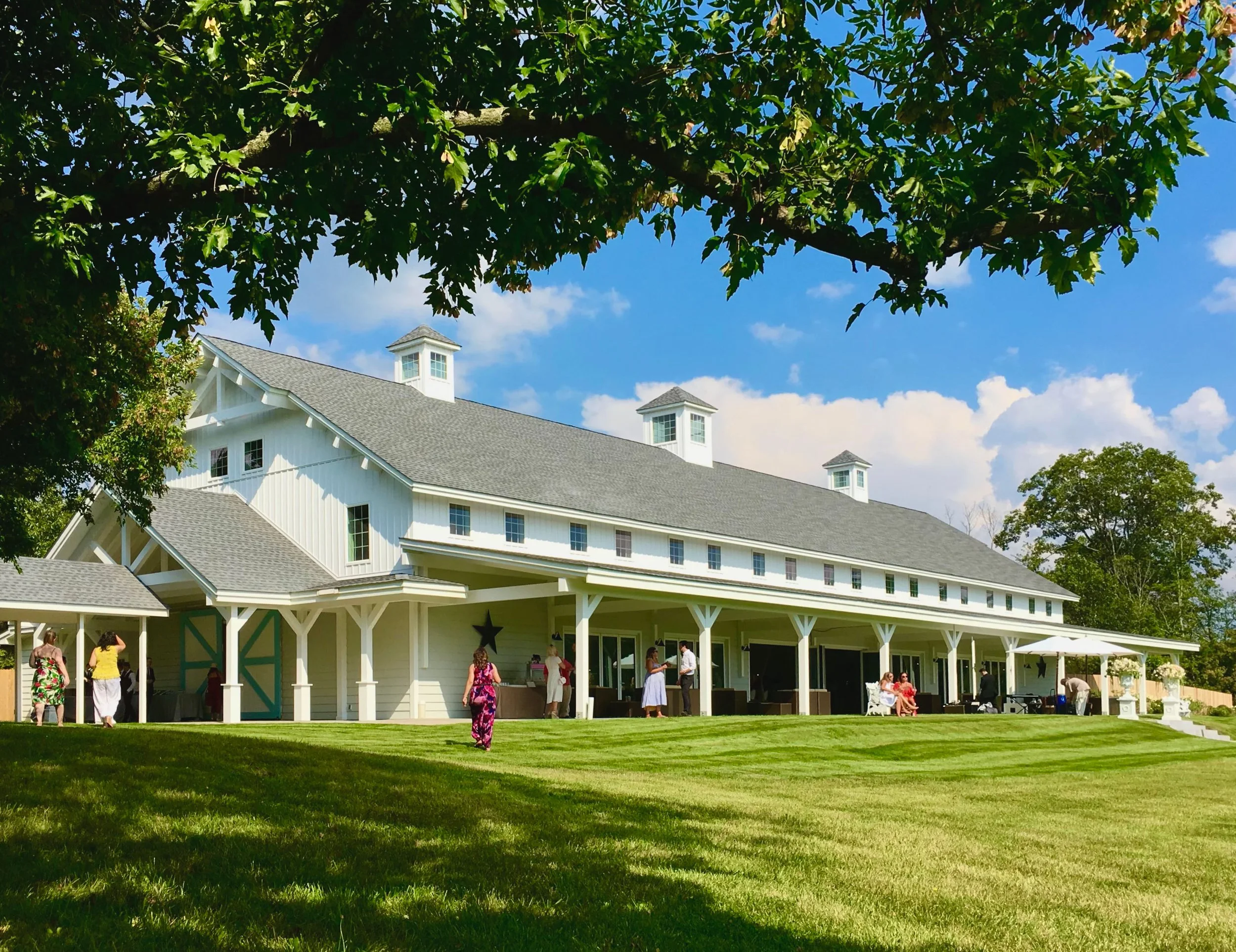 GLENMERE - EXTERIOR 1 W GUESTS.jpg