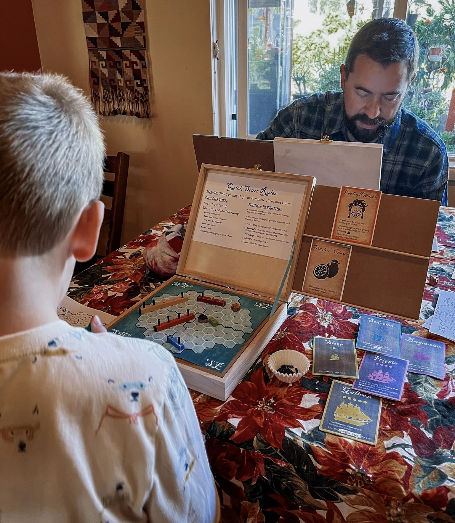 December 2022. Ryan playing with his son.