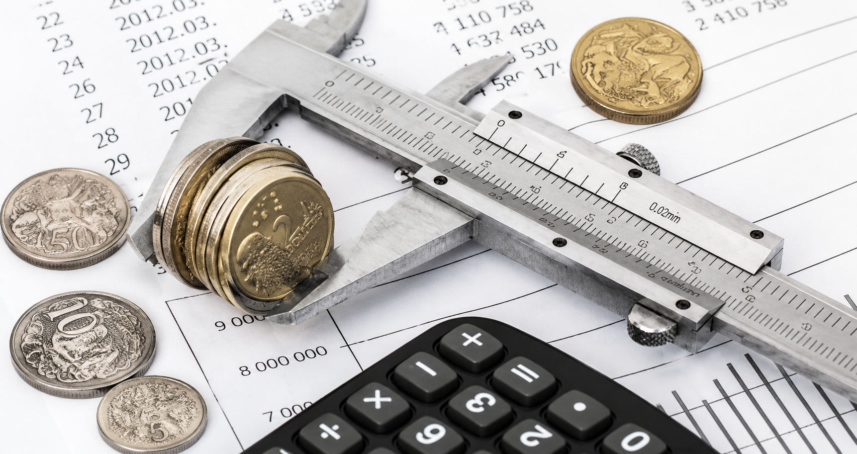 Close-up view of money and vernier caliper.