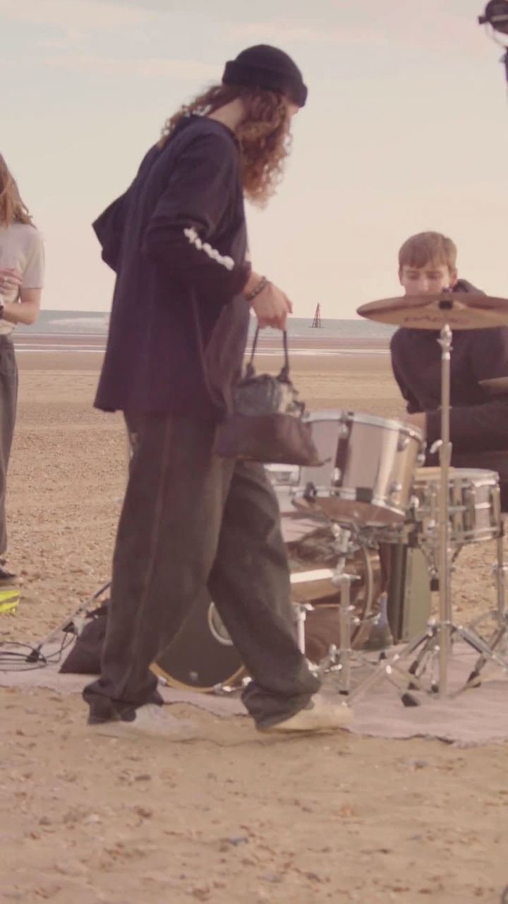 Behind the scenes of the Torus music video on a beach in Kent