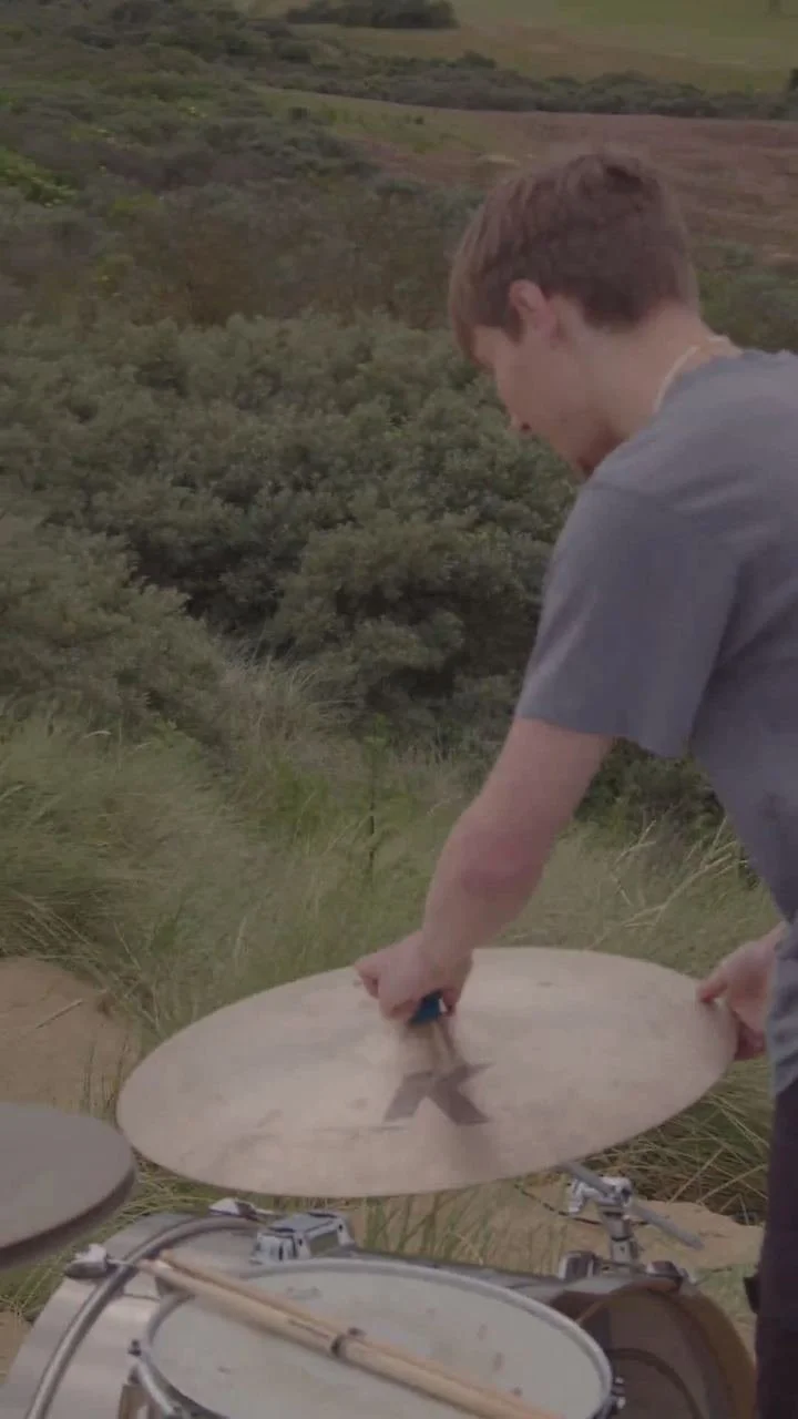 Behind the scenes of the Torus music video on a beach in Kent