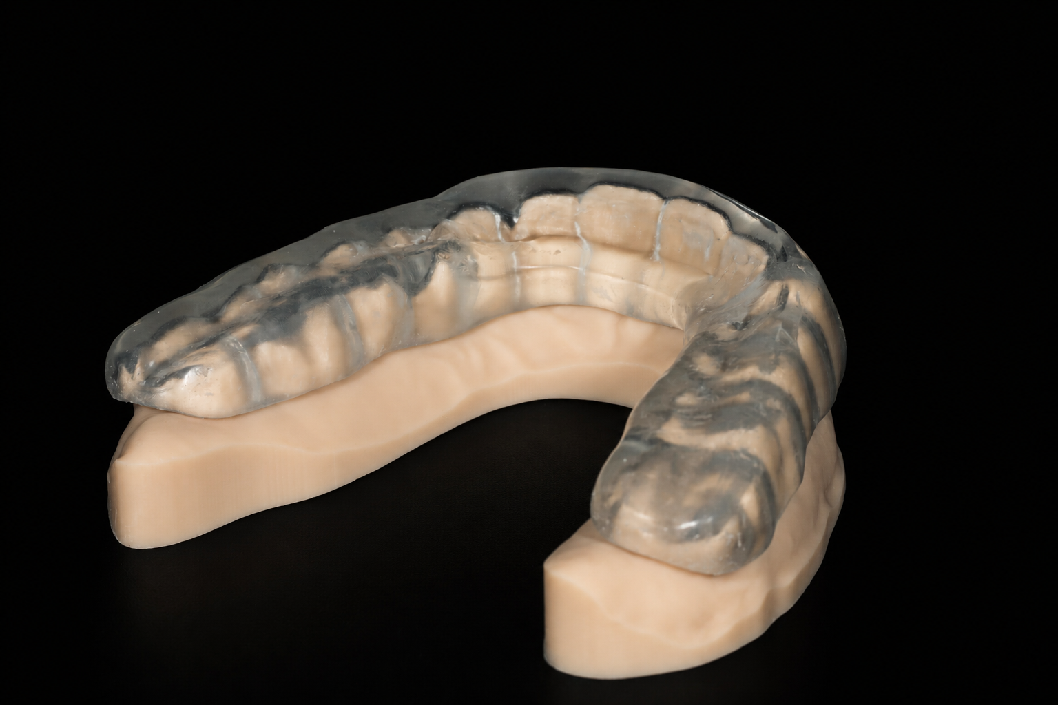 A dental night guard made of clear splint material