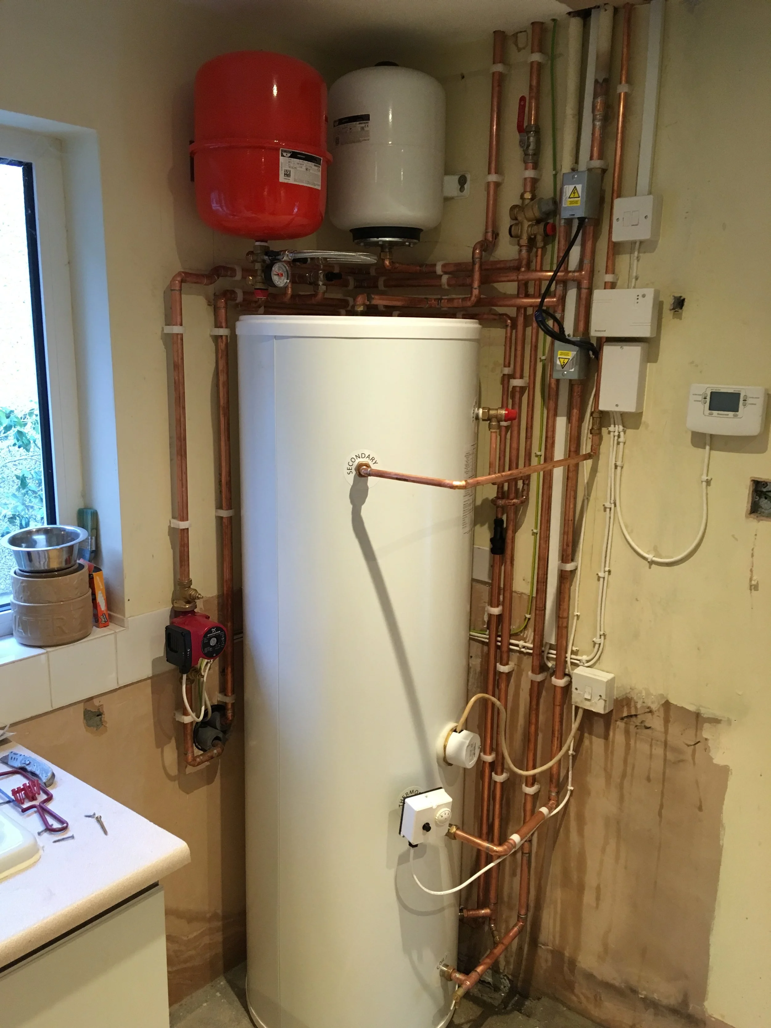 Hot water cylinder installation and repair in Ealing for improved heating and hot water performance.