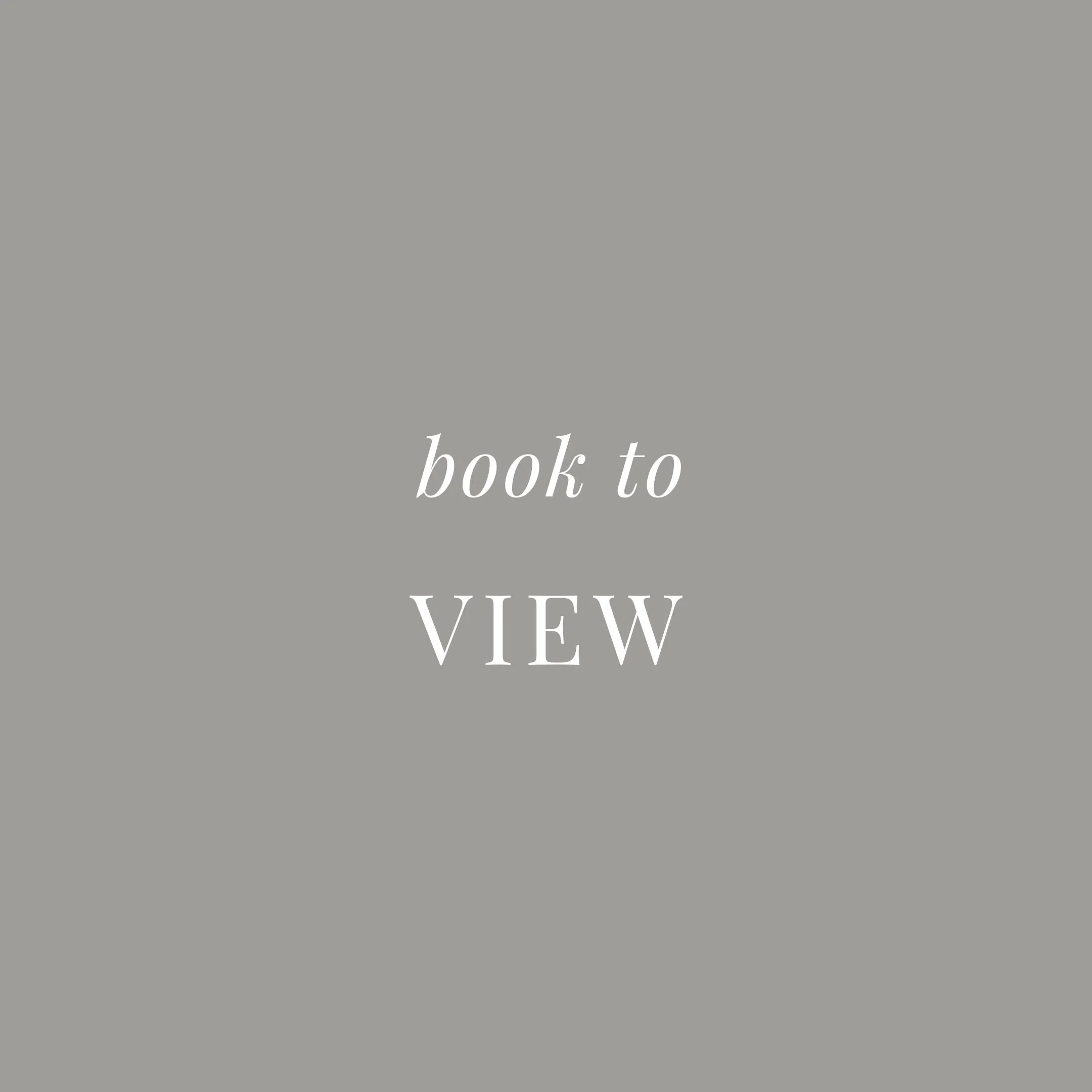 Gray background with white text saying "book to VIEW".