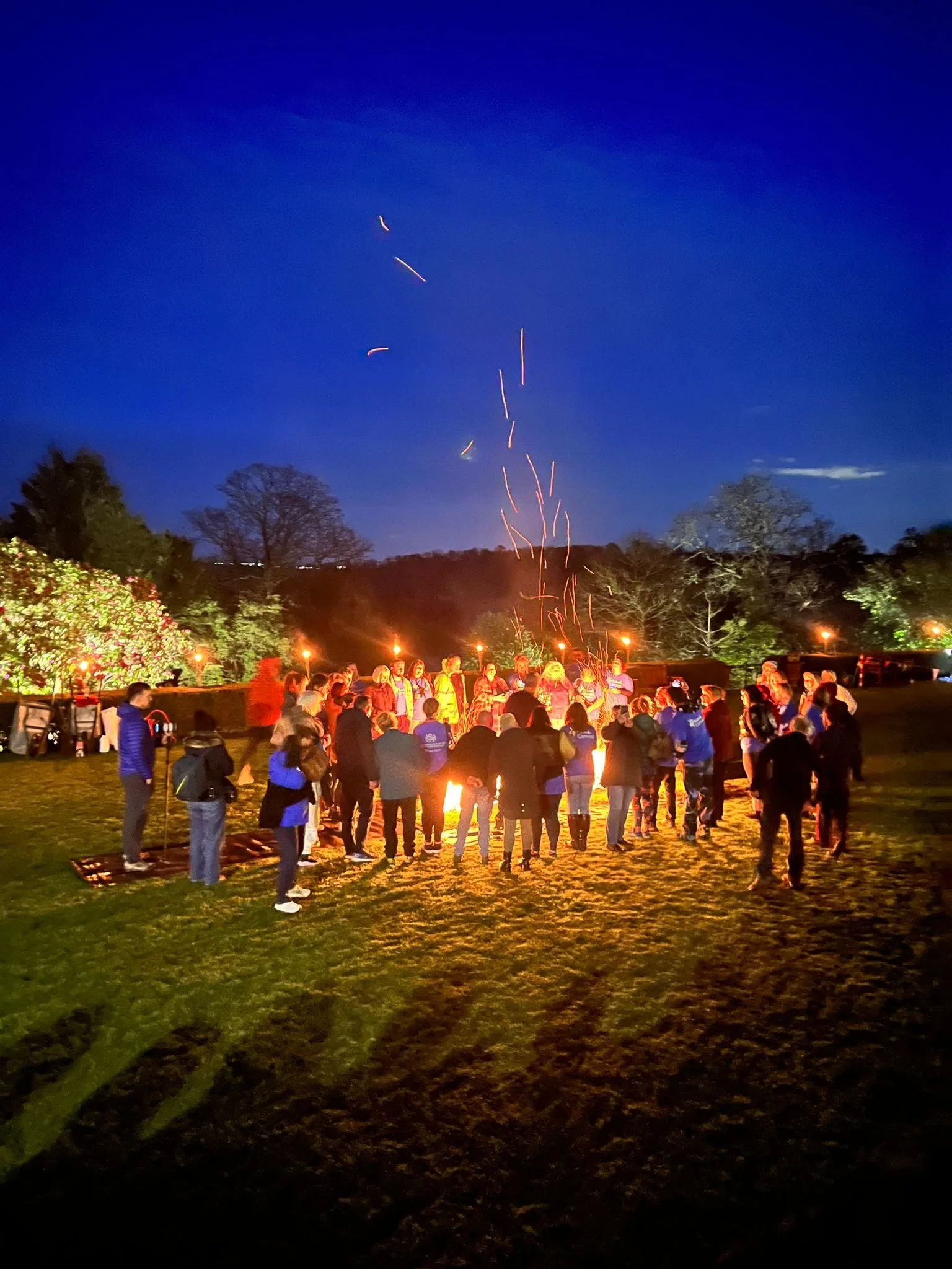 firewalkers talk around fire.jpeg