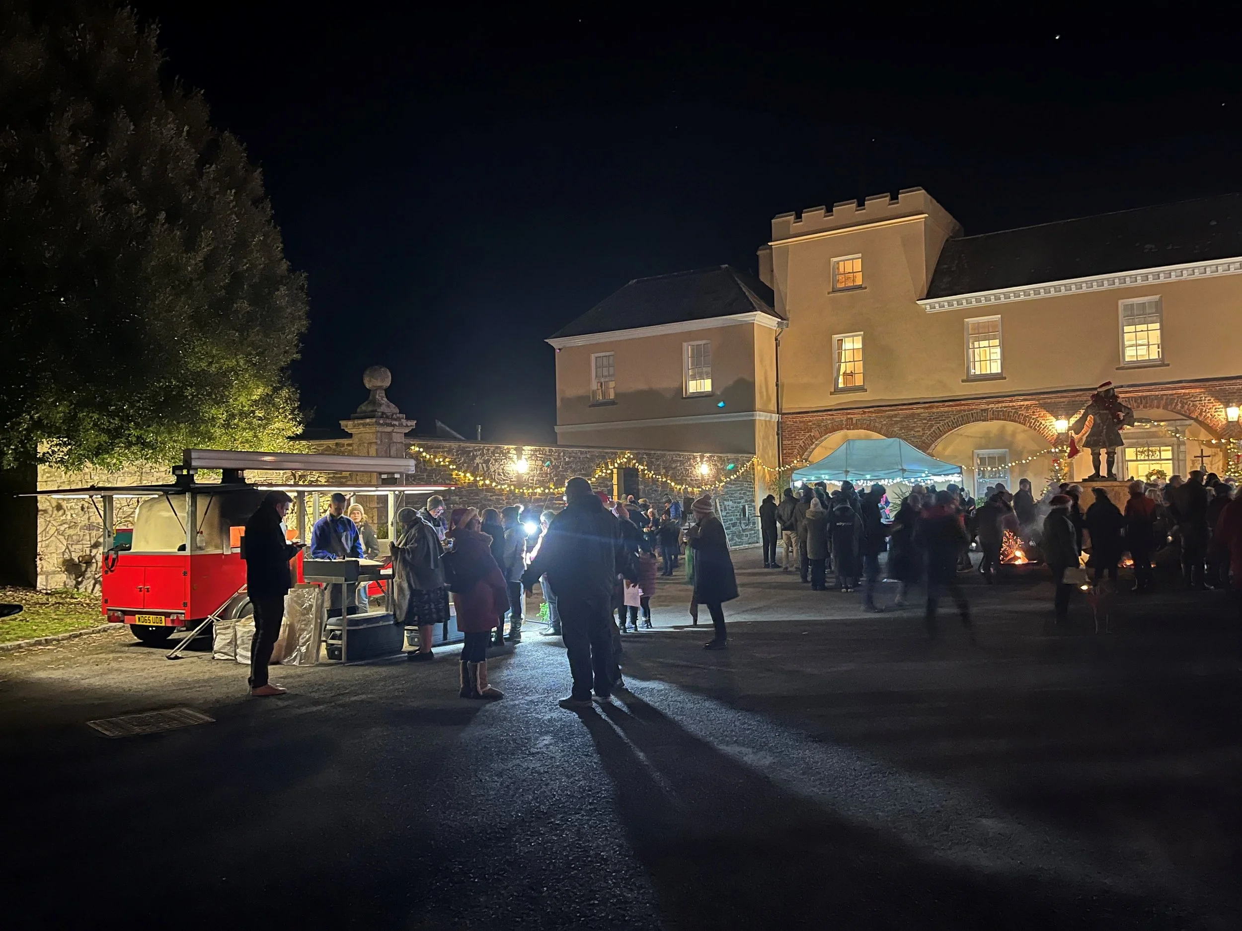 2022_carols in the courtyard attendees arriving.jpg