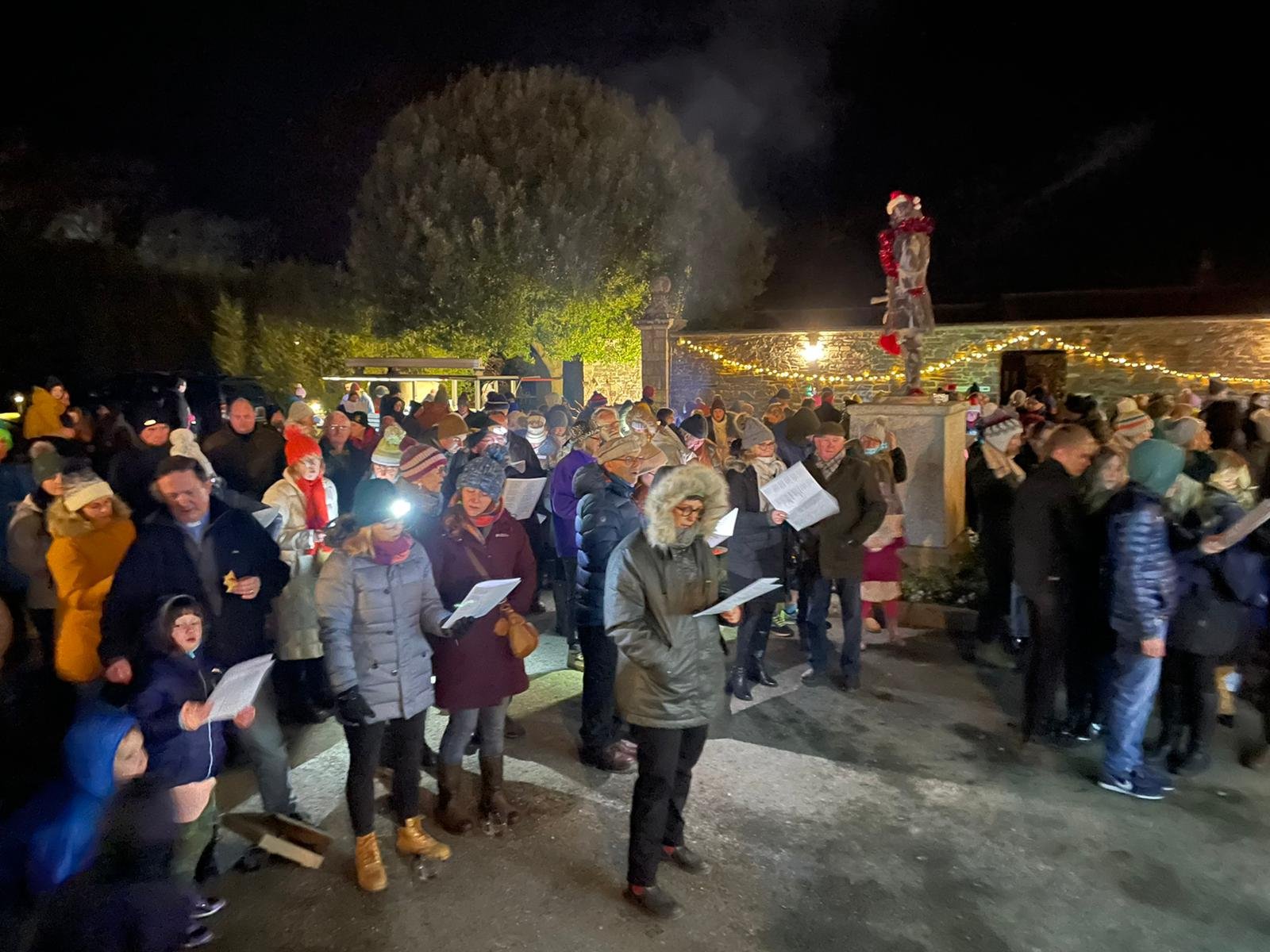 2022_carols in the courtyard attendees singing.jpg