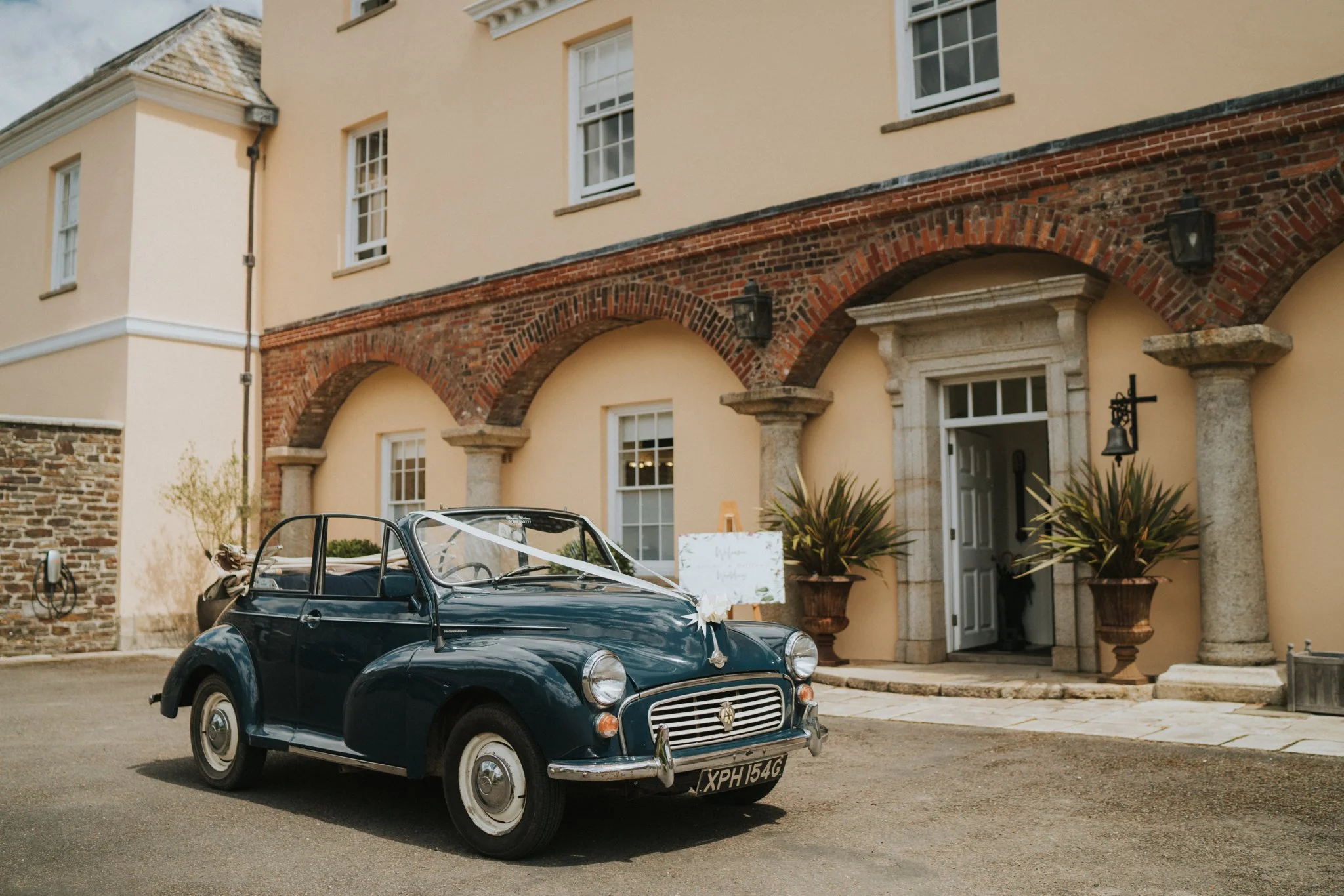 Classic car outside of Pentillie Castle. Photographed by Elizabeth Grace Photography.