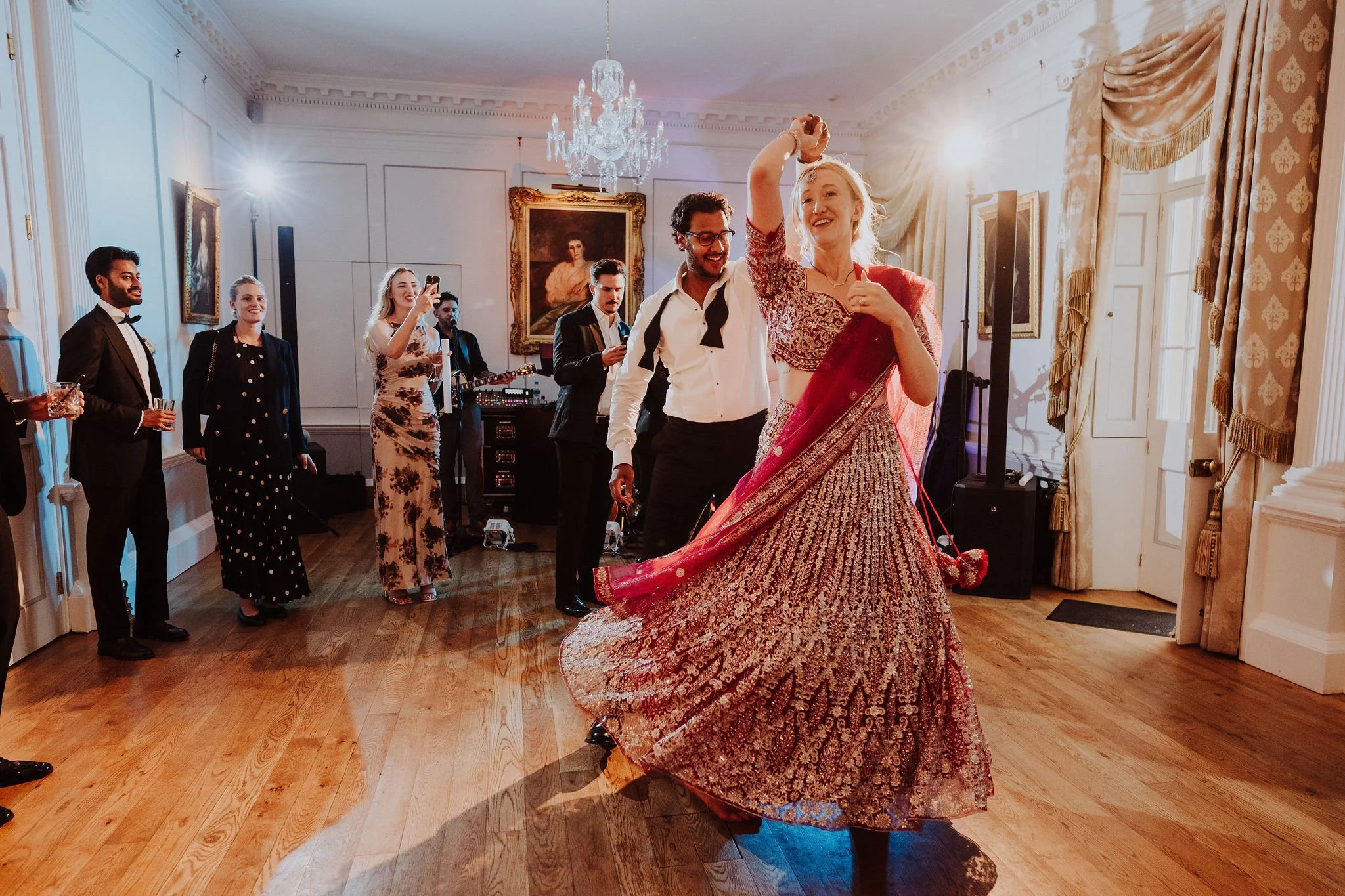 Bride and groom dancing during evening reception. Photographed by Amy Sampson.