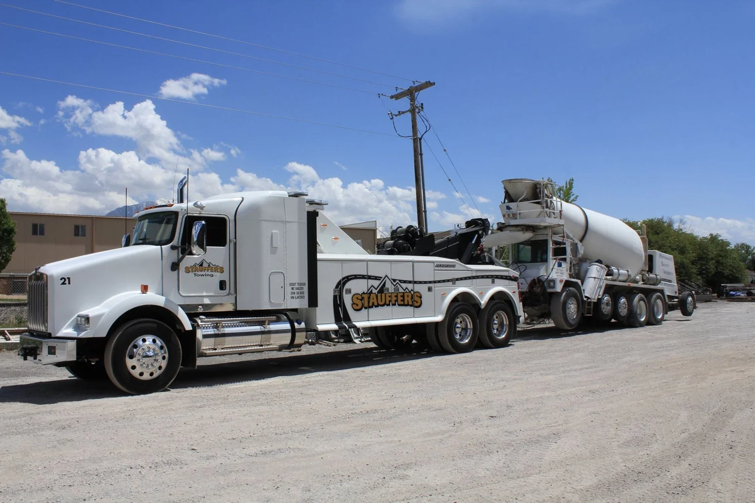 Stauffer's heavy-duty tow truck supporting a commercial vehicle