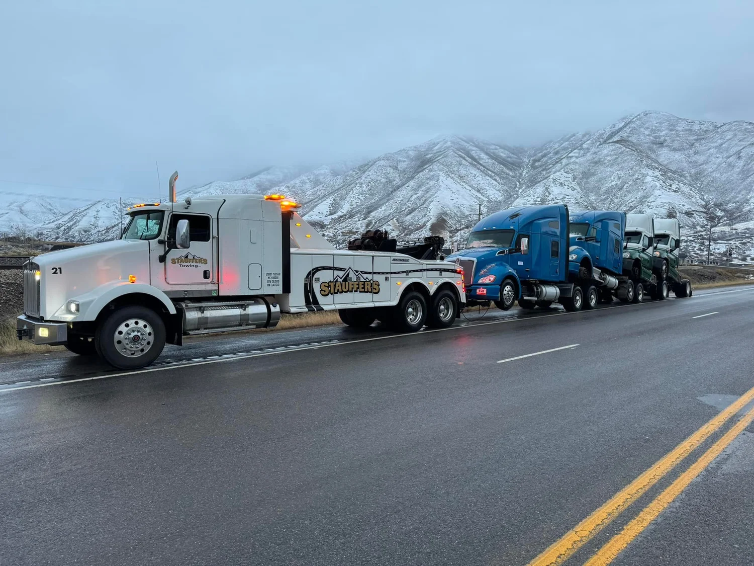 Stauffer's tow truck providing vehicle towing service