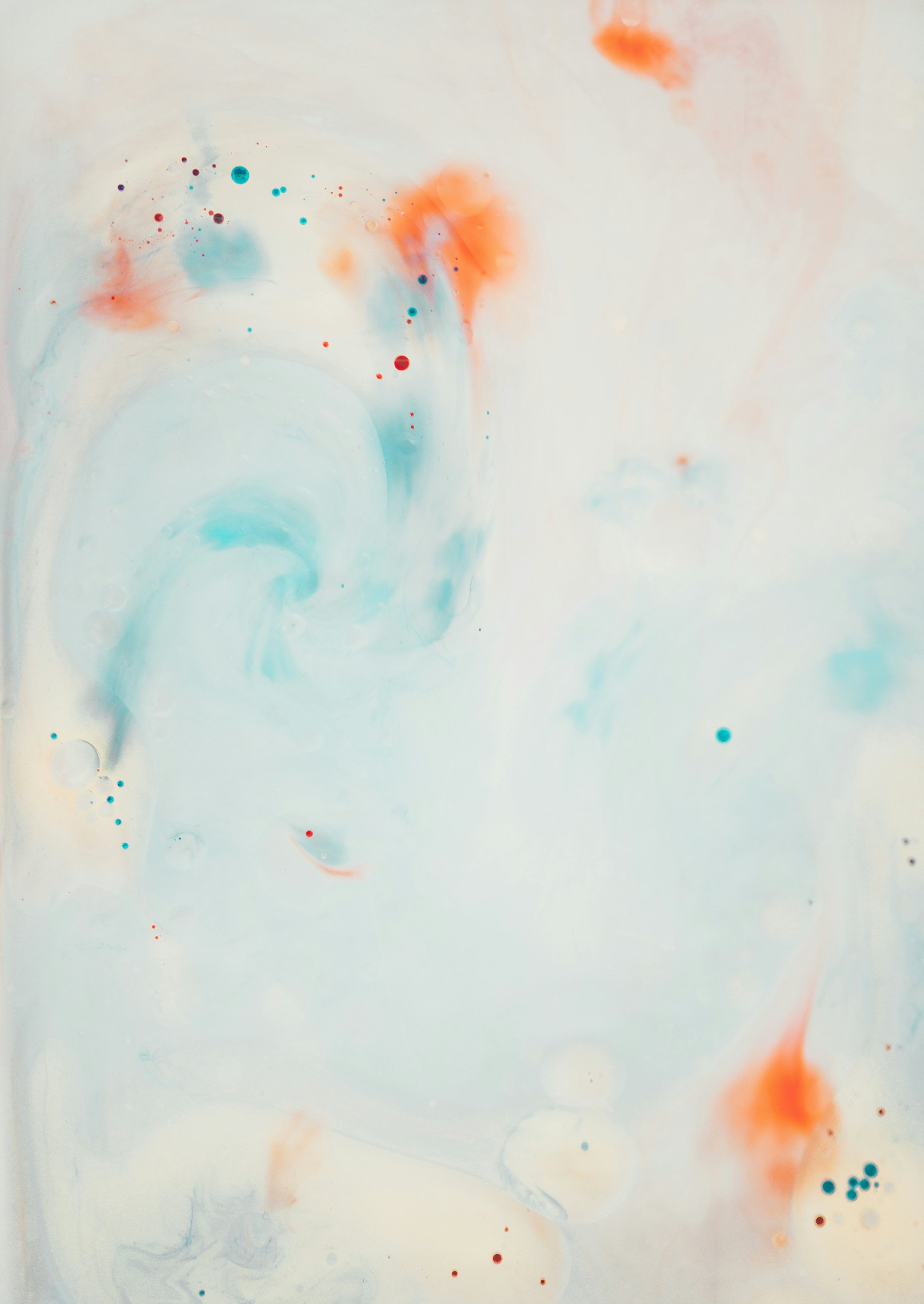 Abstract painting with swirling blue and orange streaks and scattered dots on a light background.
