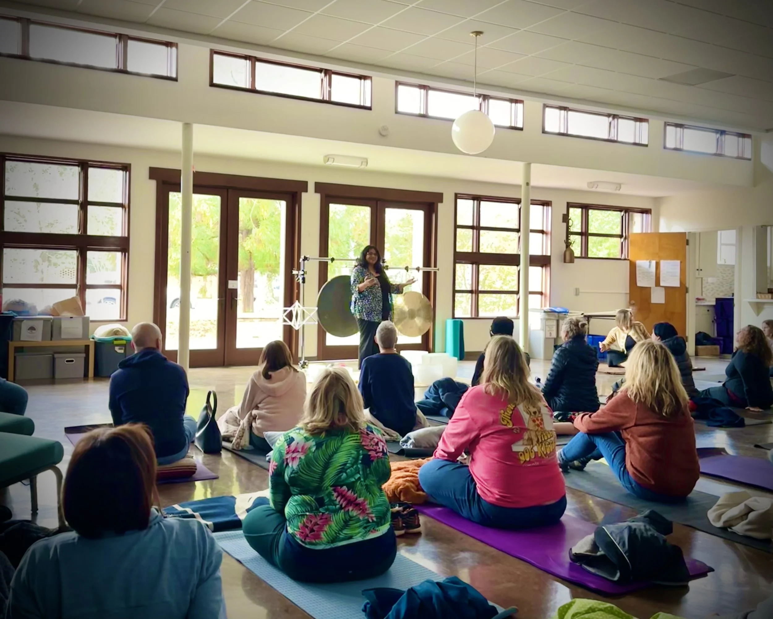 Sudha McFadden leading a mindful sound bath meditation in South Carolina