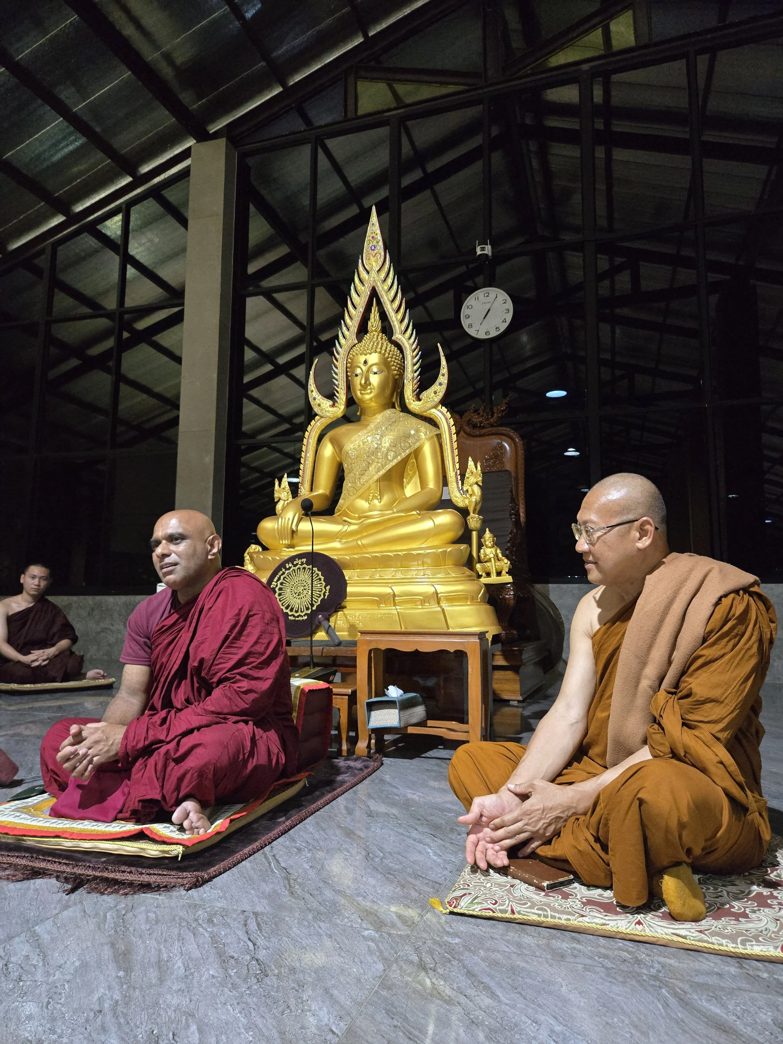 DVA President and Thailand Project presenter Venerable Lyn address Thai monks at retreat center. 