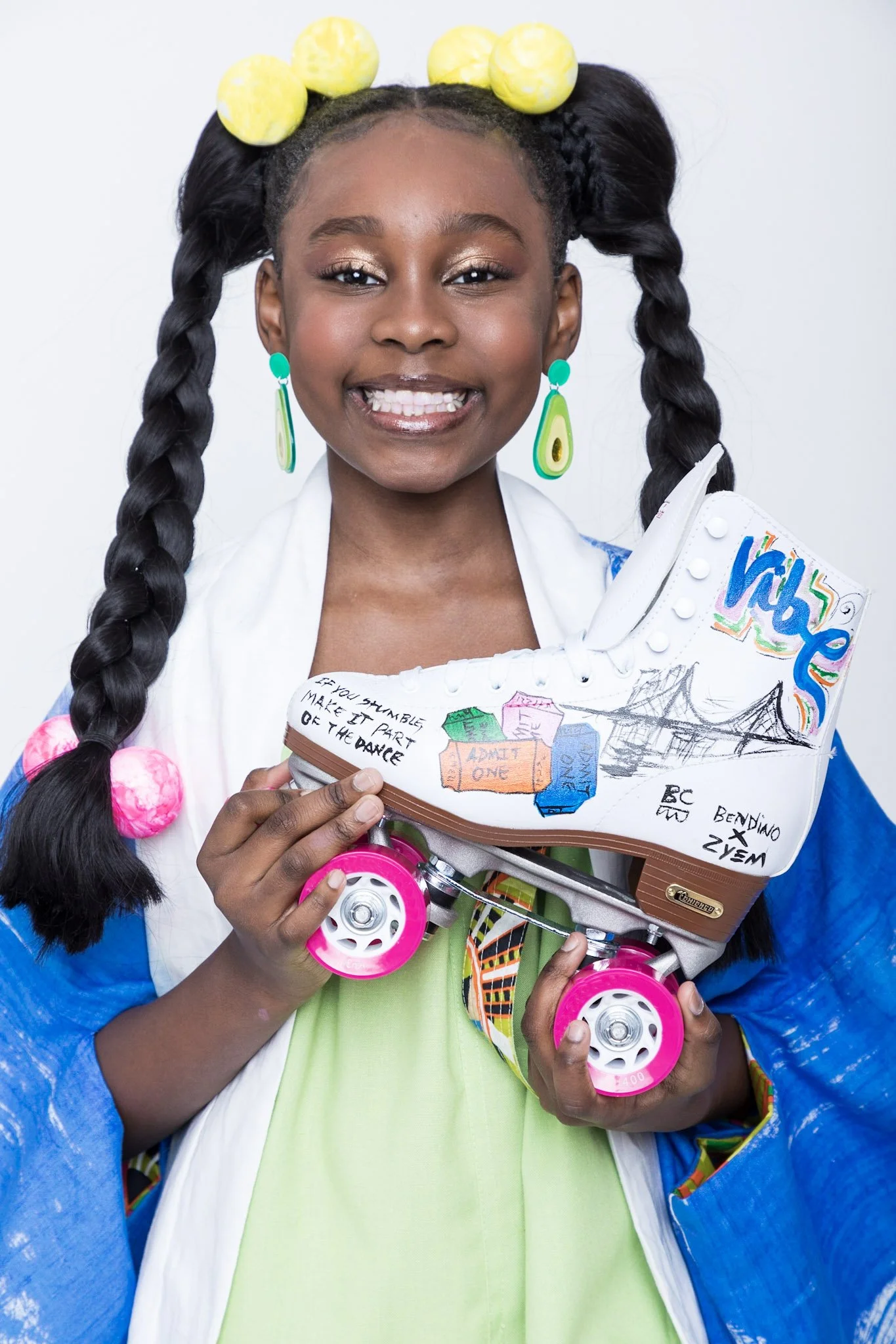 girl posing with ZYEM roller skate, kids fashion