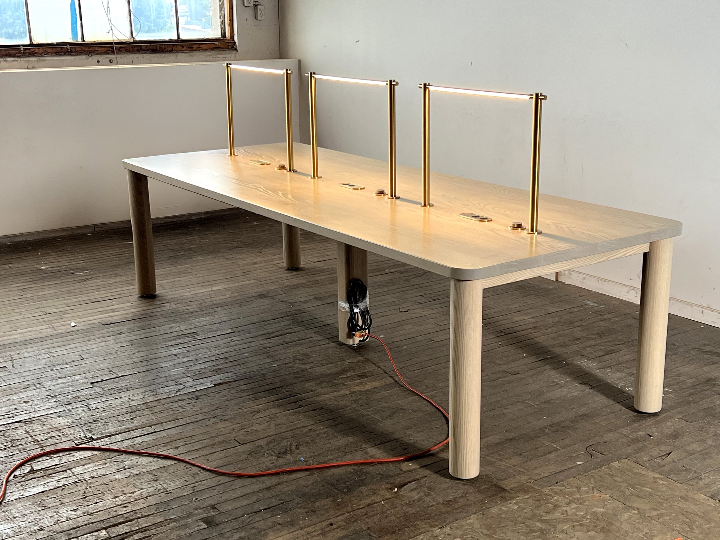 Library table with integrated power, USB ports and light