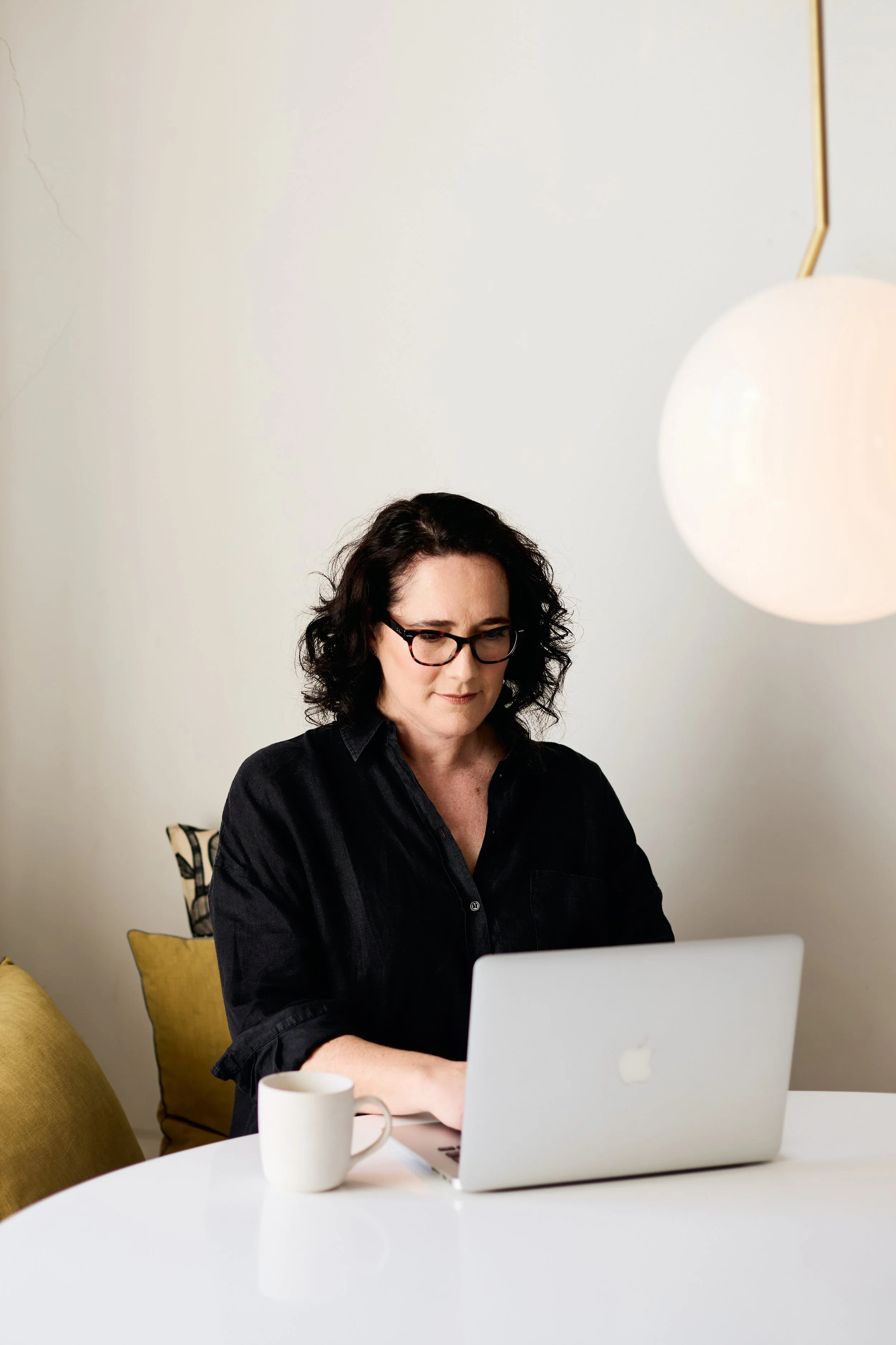 Kate Casali mindset coach and ski confidence coach designing a hypnotherapy script