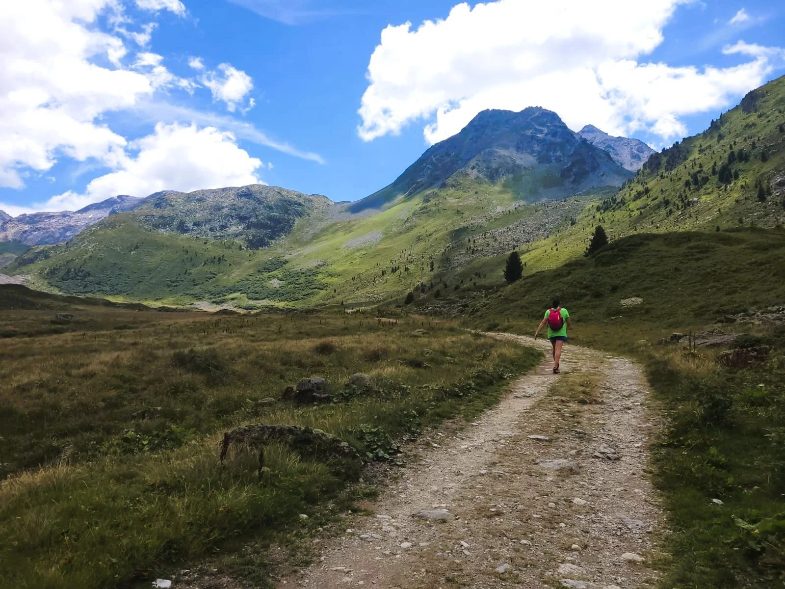 Kate The Ski Mindset Coach walking up the mountain.jpeg