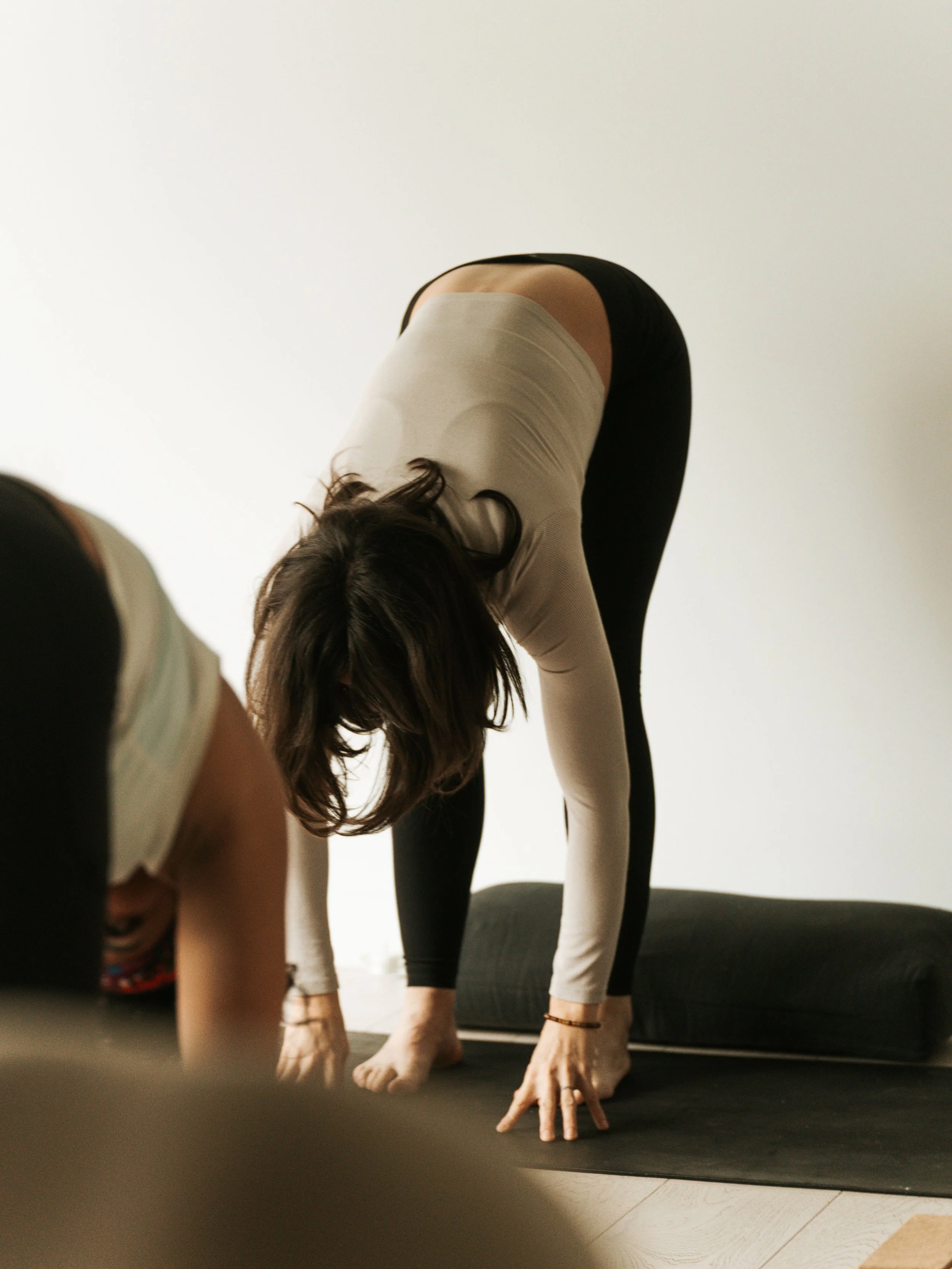 Deep stretch yoga posture targeting hips and hamstrings to support flexibility, muscle recovery, and relaxation