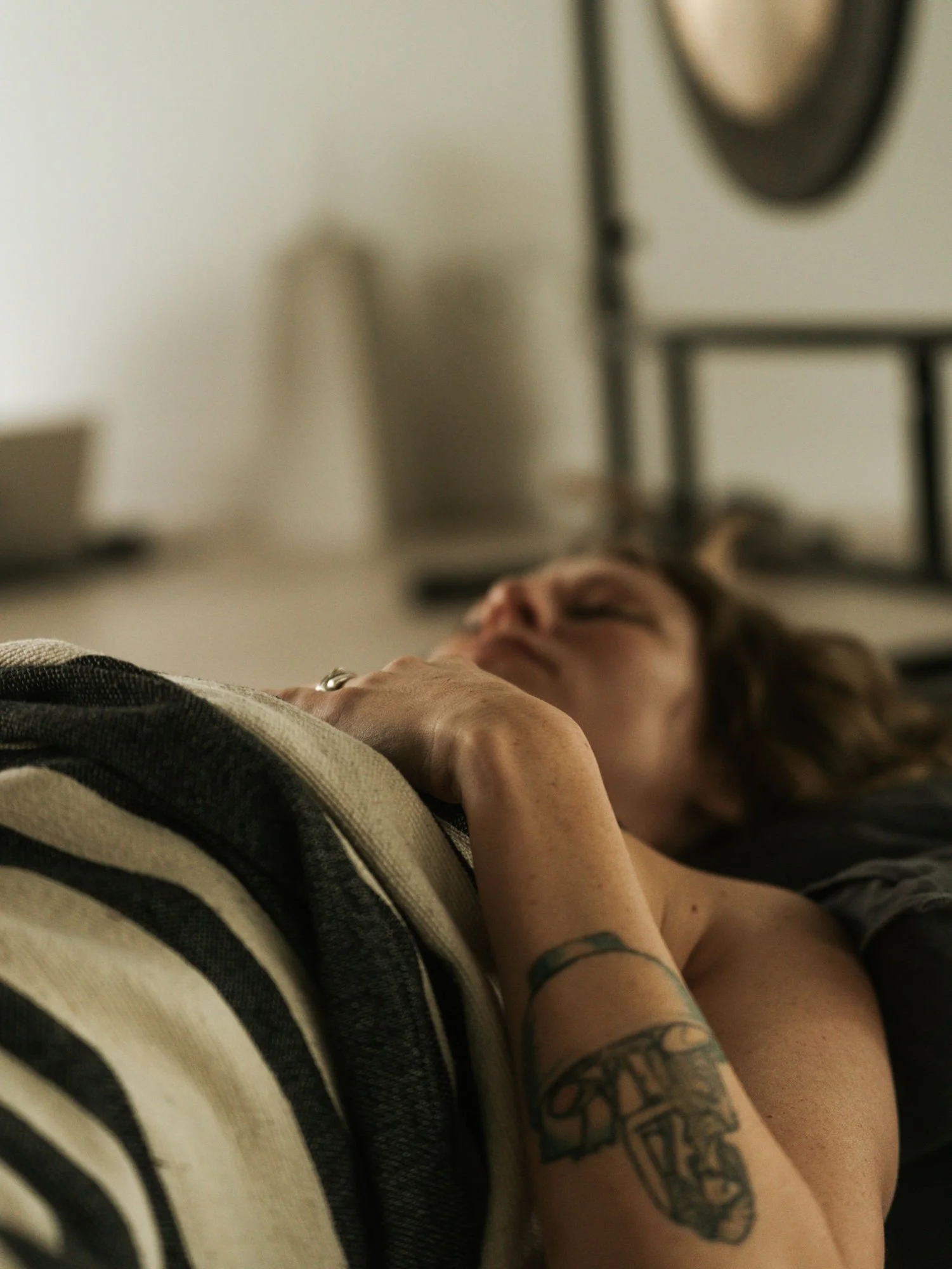 Breathwork facilitator leading a conscious breathing session at Ritual Urban Retreat in Vancouver.