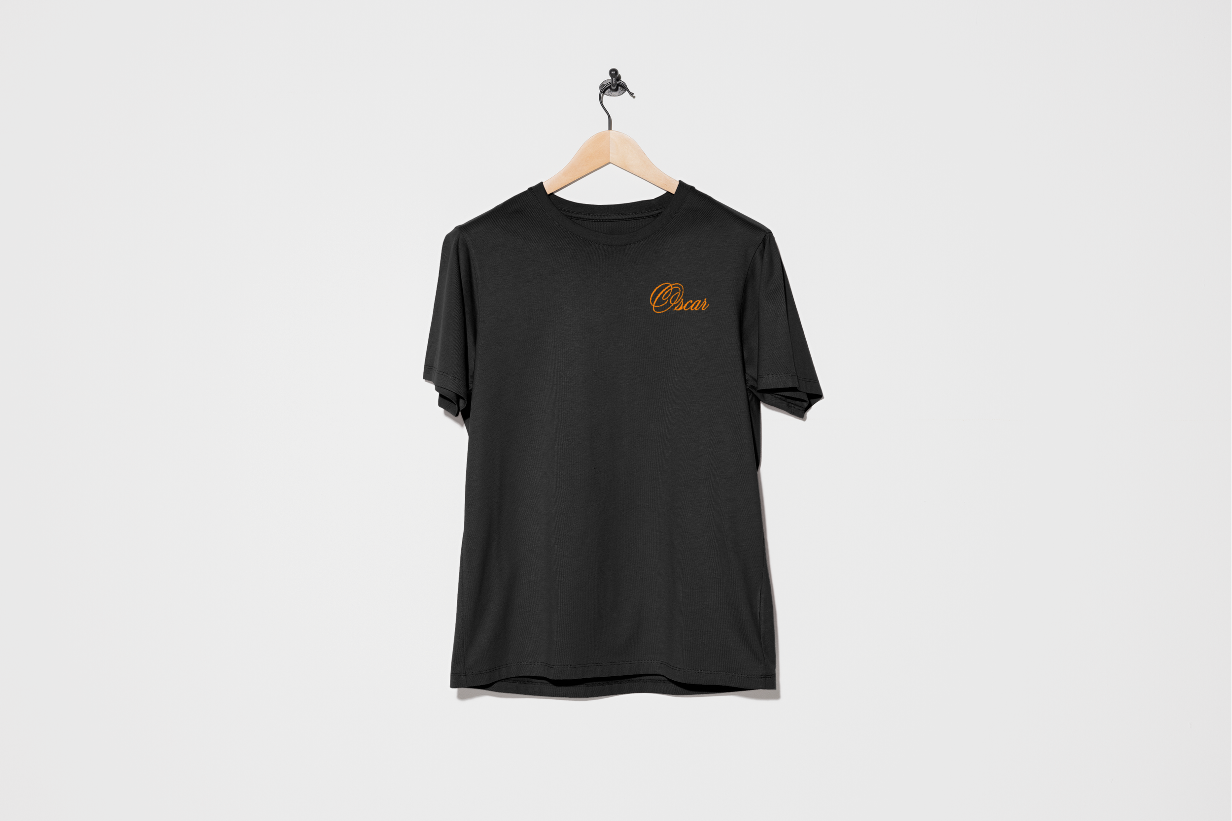 Bitmap_Hanger_1_CleanWht_Oscar_Front.png