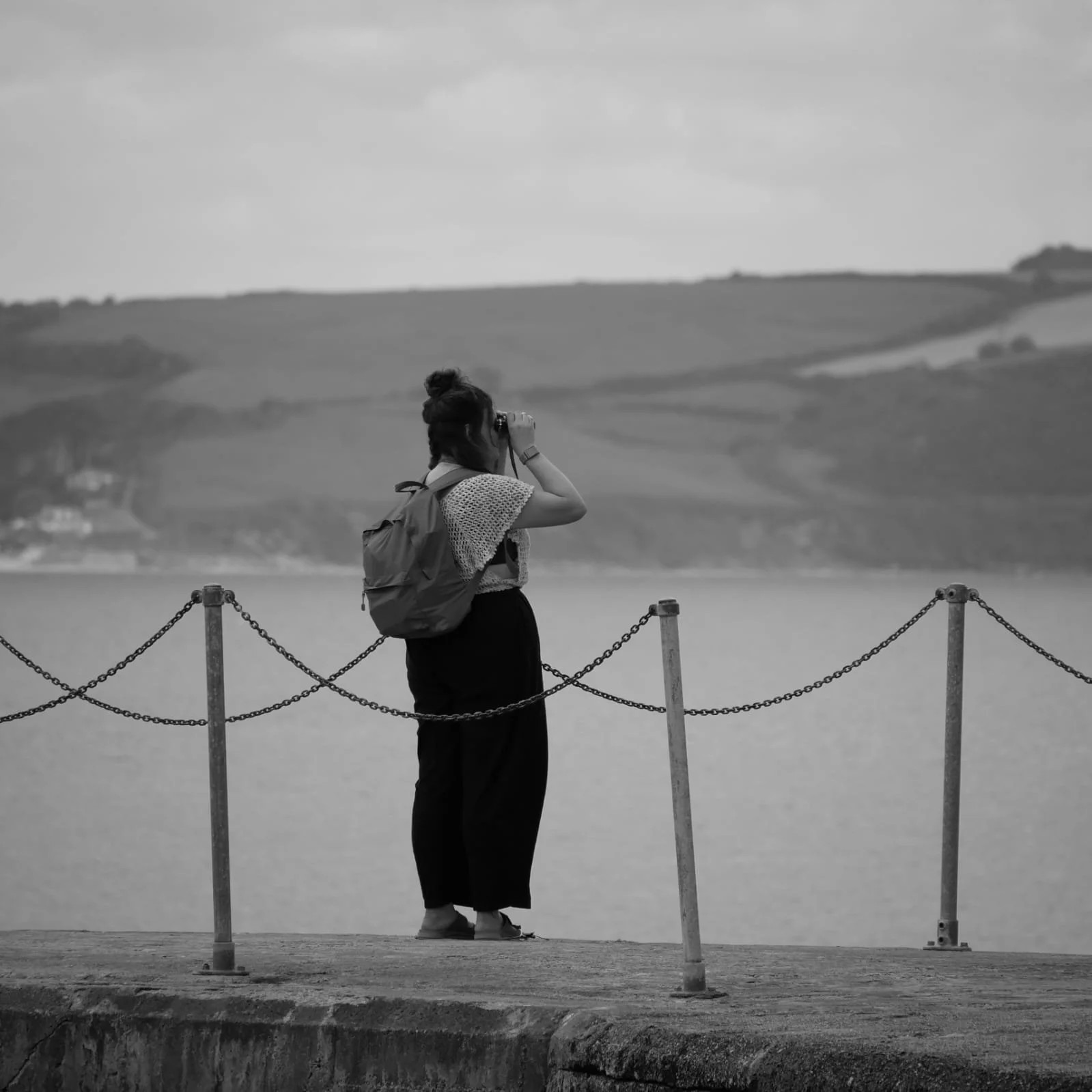 Observing her surroundings for inspiration...