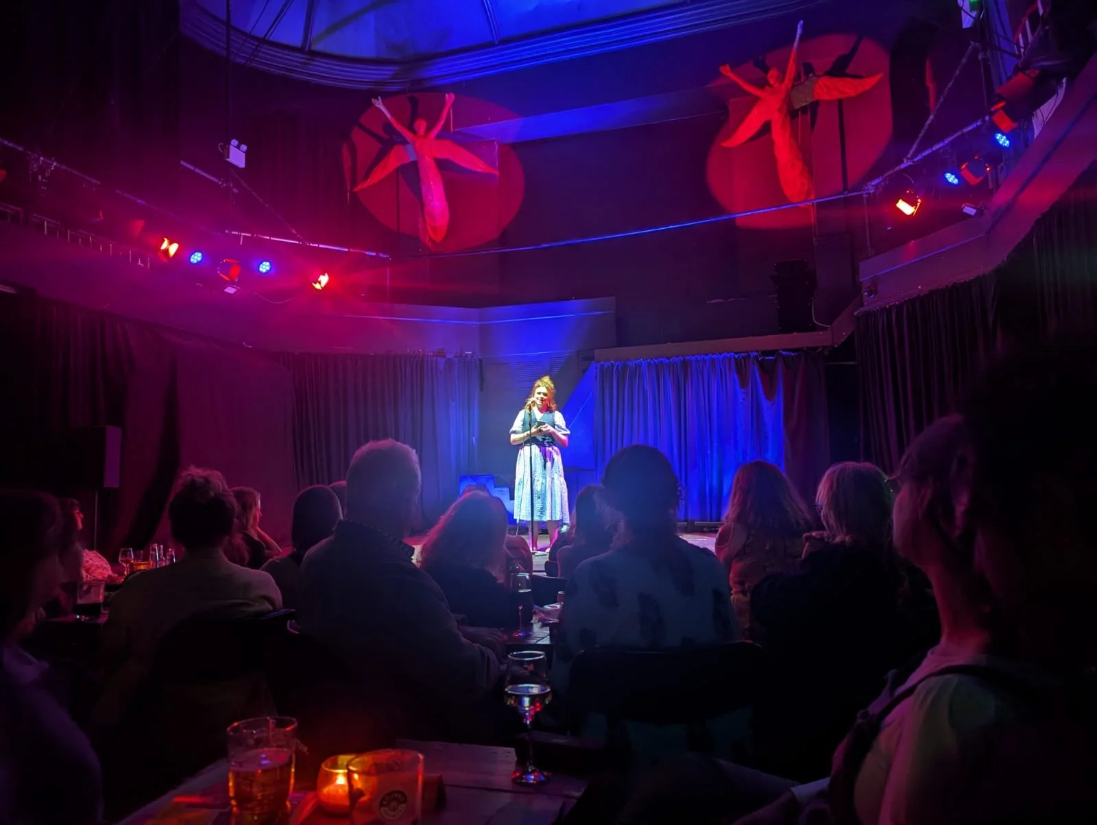 Bella Wilhm Reading Poetry On Stage