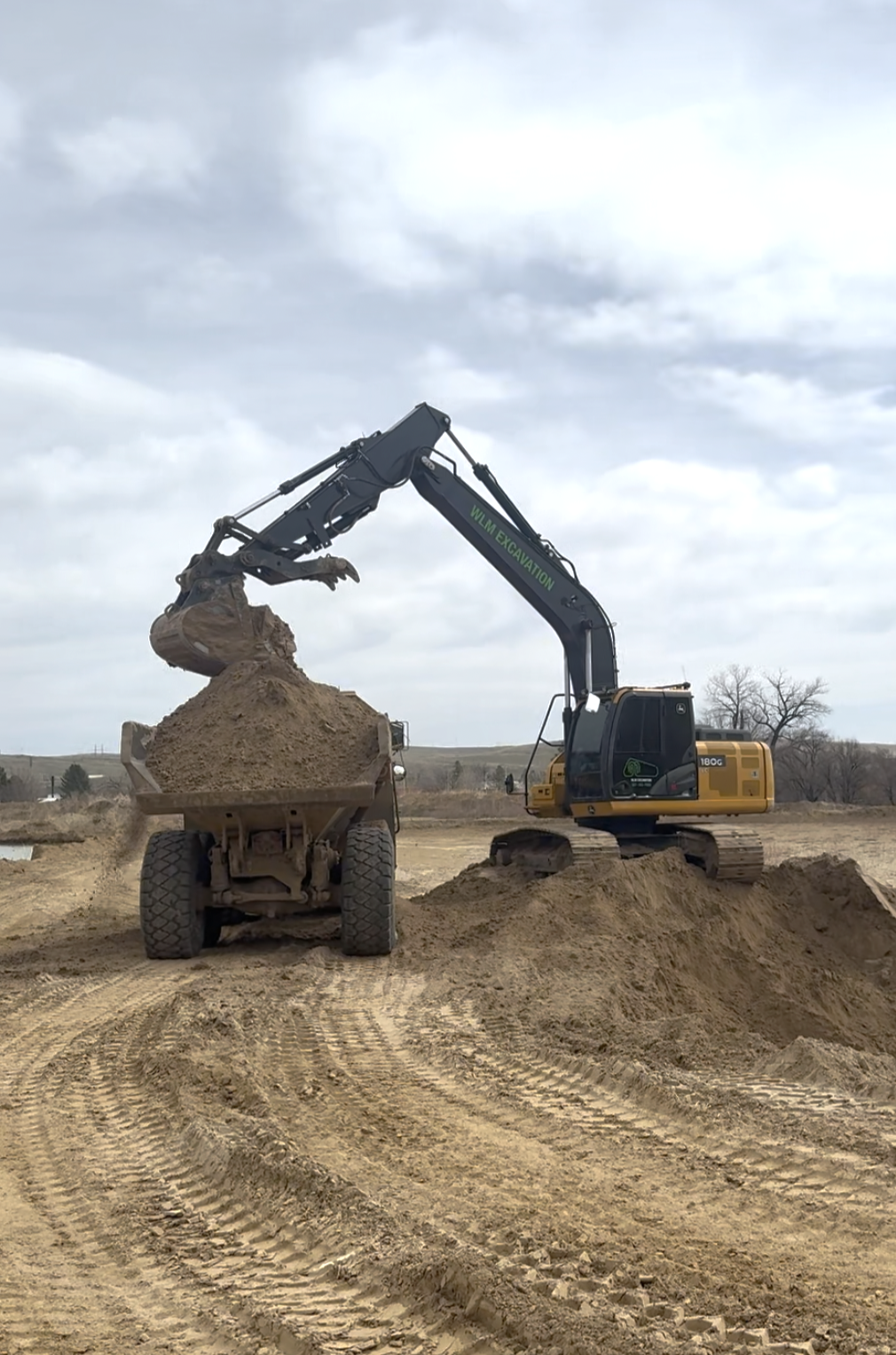 dump truck and excavator.PNG