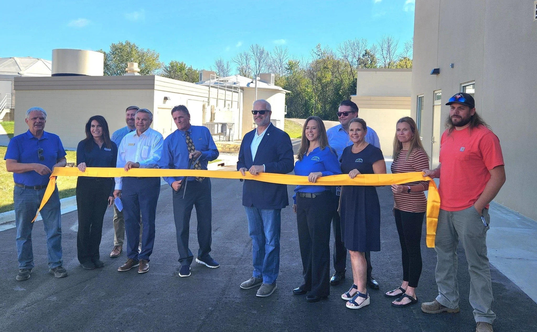 Deborah Everson and fellow community leaders at the ribbon cutting for Watertown's new waste water treatment plant.