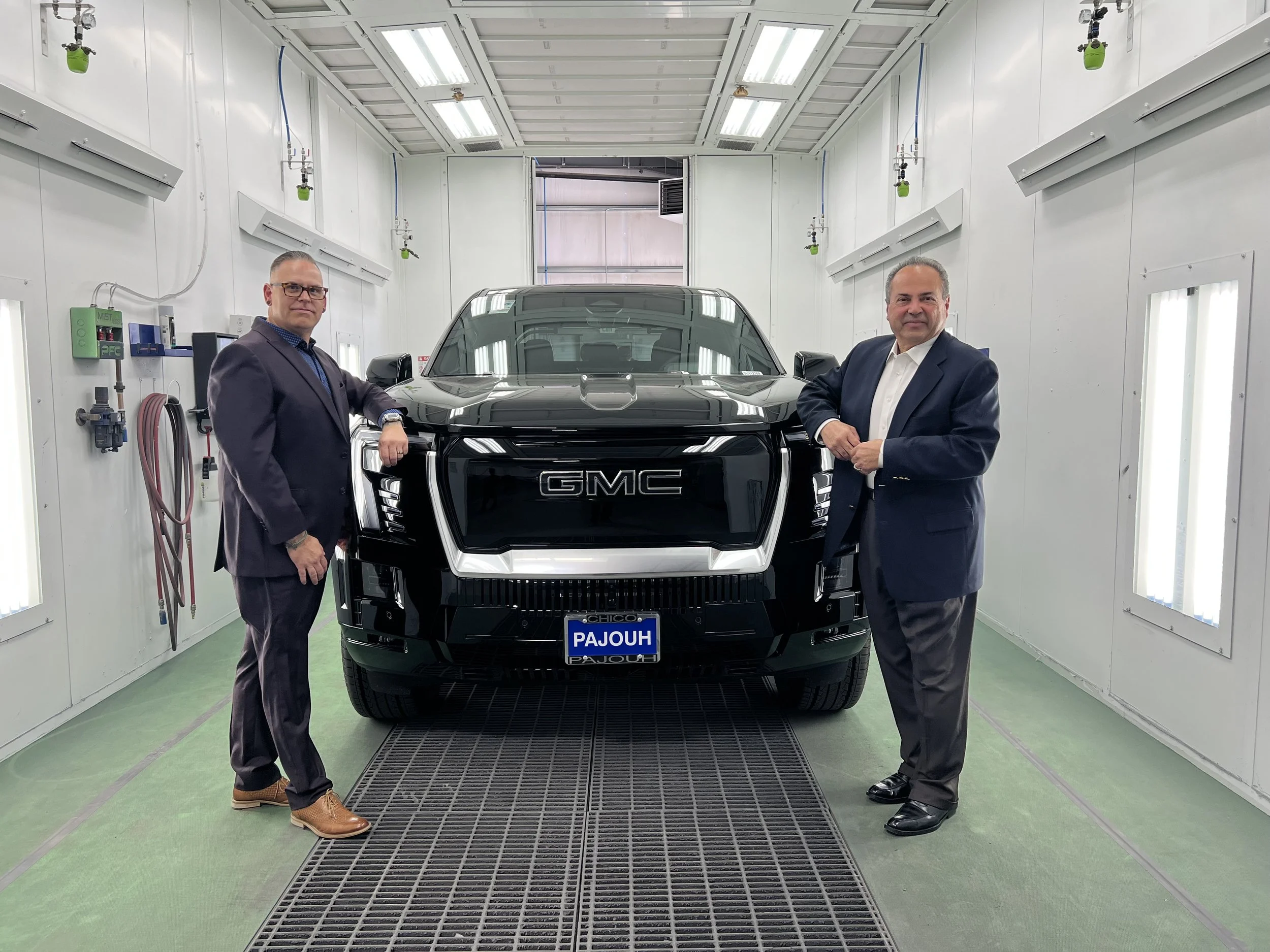 Pajouh Collision team reviewing a collision repair estimate with a customer in Chico, CA