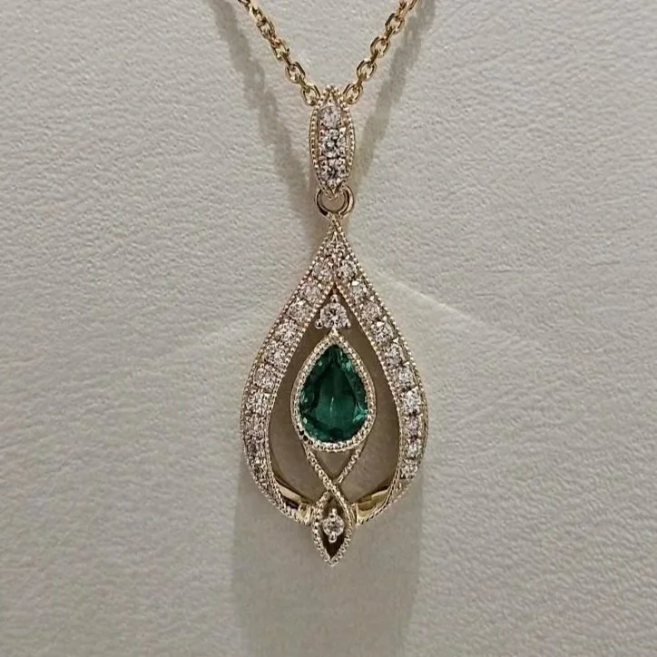 14kt Yellow Gold Emerald & Diamond Necklace